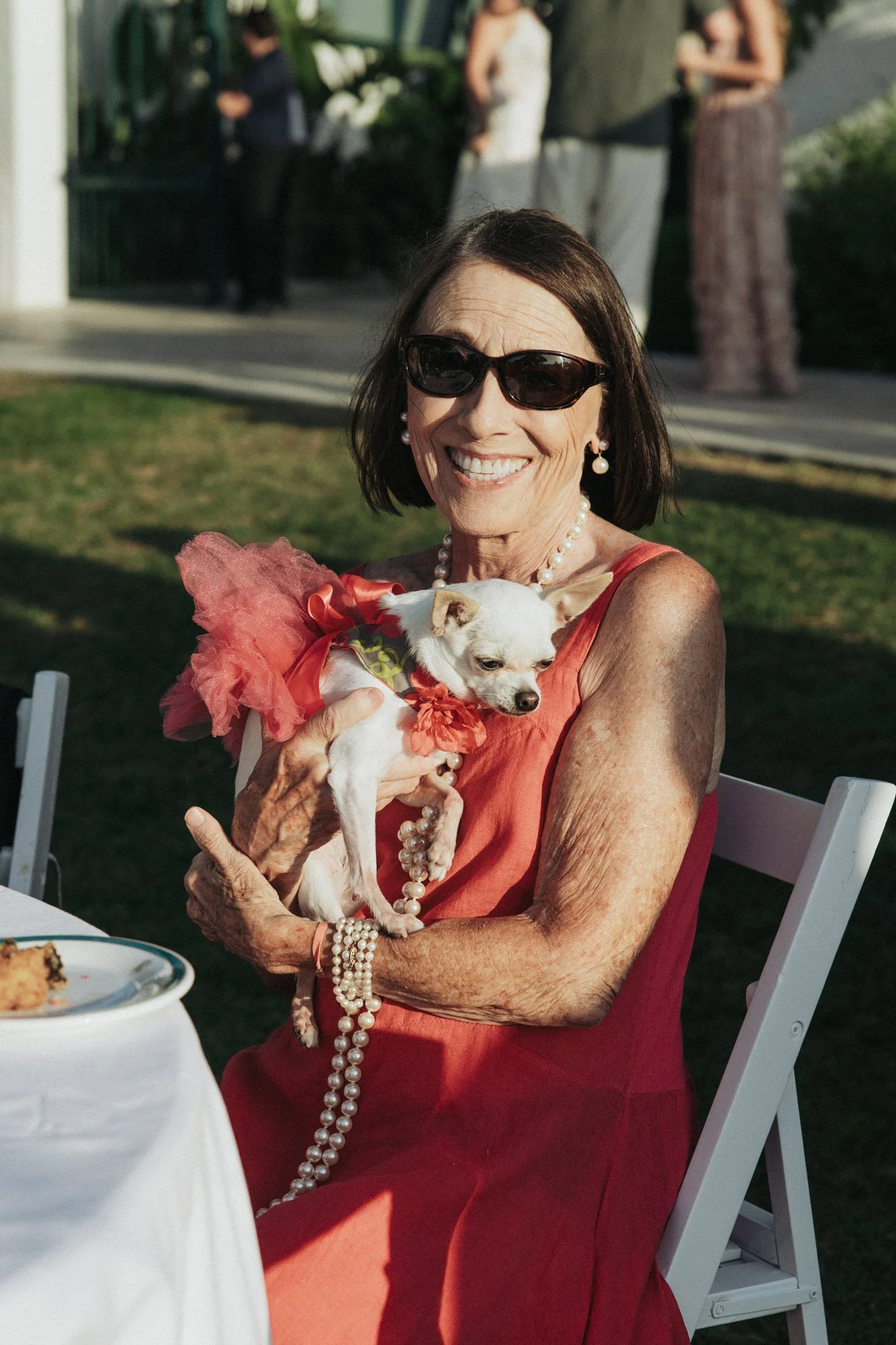 wedding-guest-with-dog-at-cocktail-portrait-alcazar-del-garraf-girona-destination-wedding-photographer.jpg