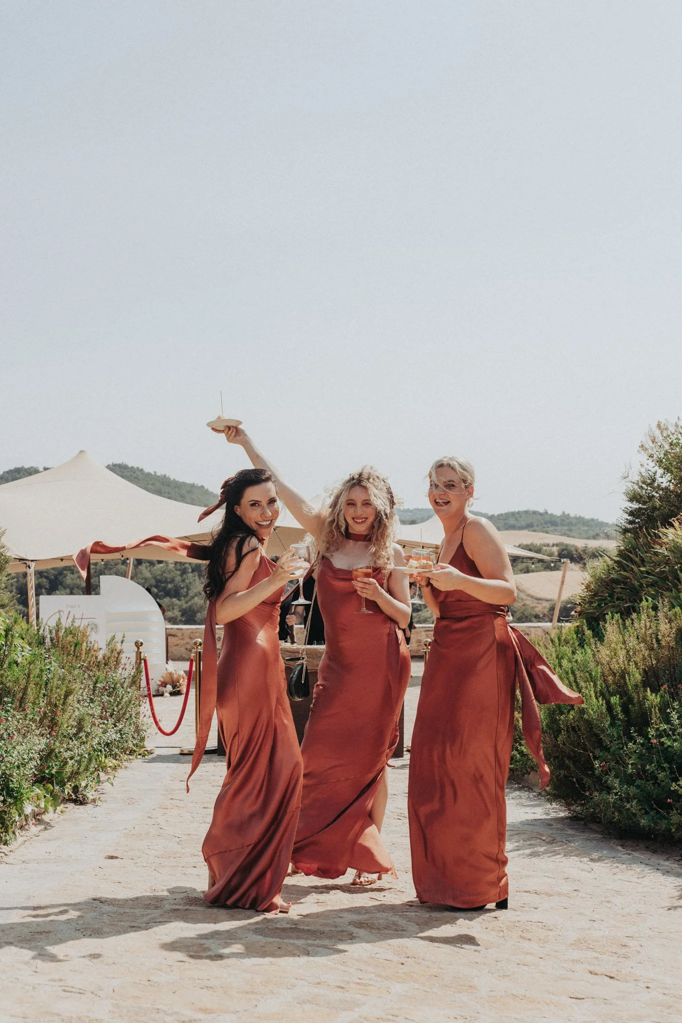 fun-bridesmaids-portrait-at-venue-gardens-alcazar-del-garraf-girona-destination-wedding-photographer.jpg