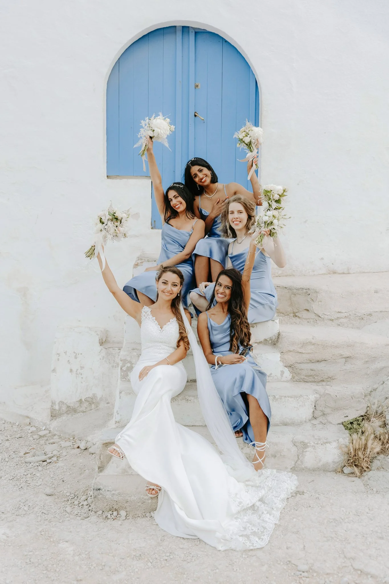bride-and-bridesmaids-portrait-at-cala-celemence-del-portichol-javea-destination-wedding-photographer.jpg
