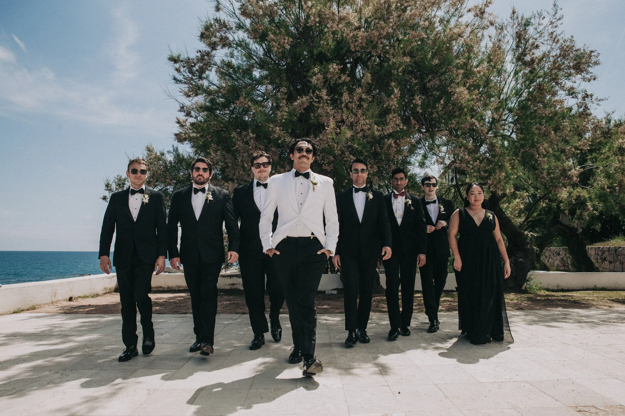 groom-with-wedding-party-portrait-hotel-santa-marta-girona-destination-wedding-photographer.jpg