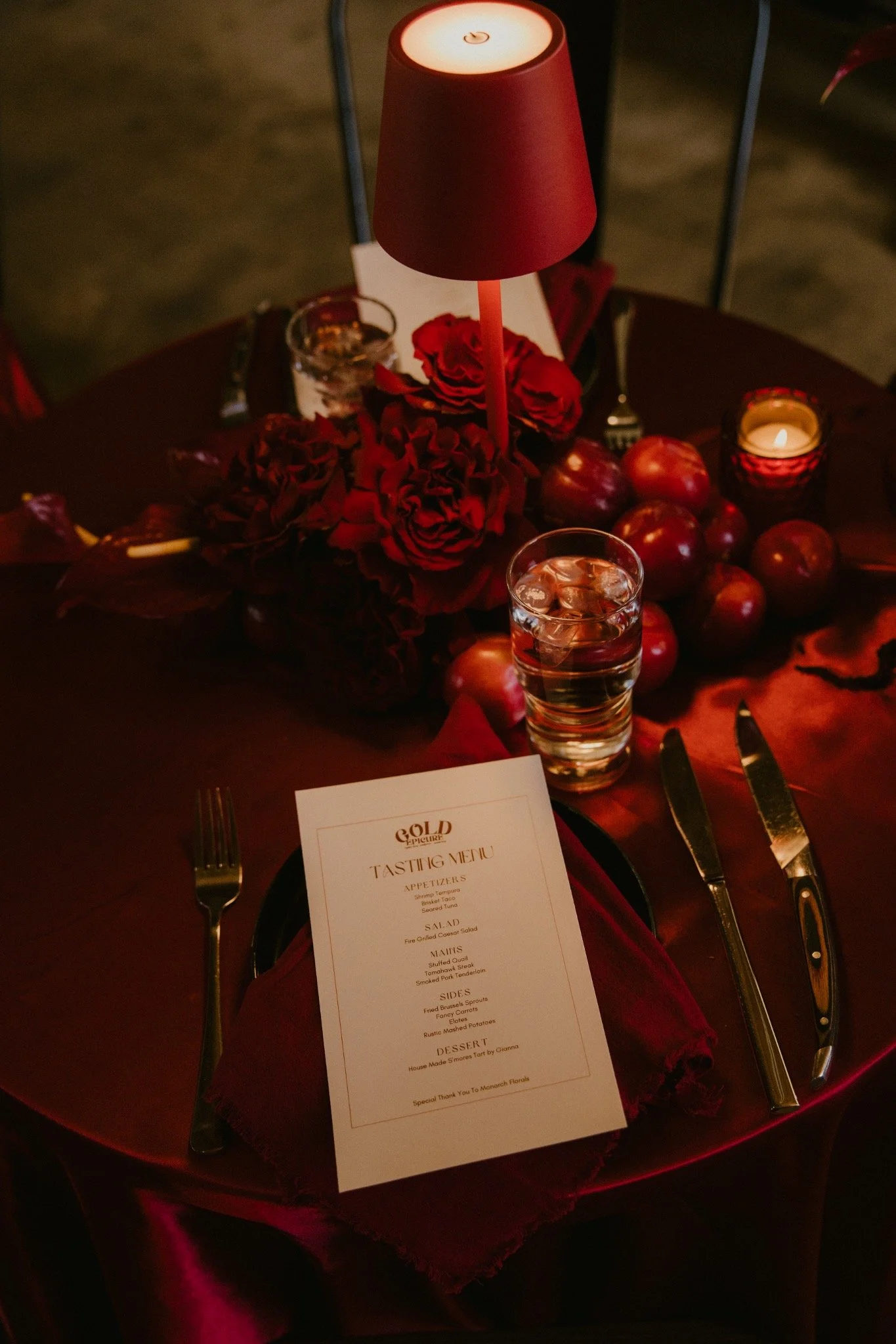 Gold Epicure tasting menu at Duetts, with red roses and a candlelit table setting.