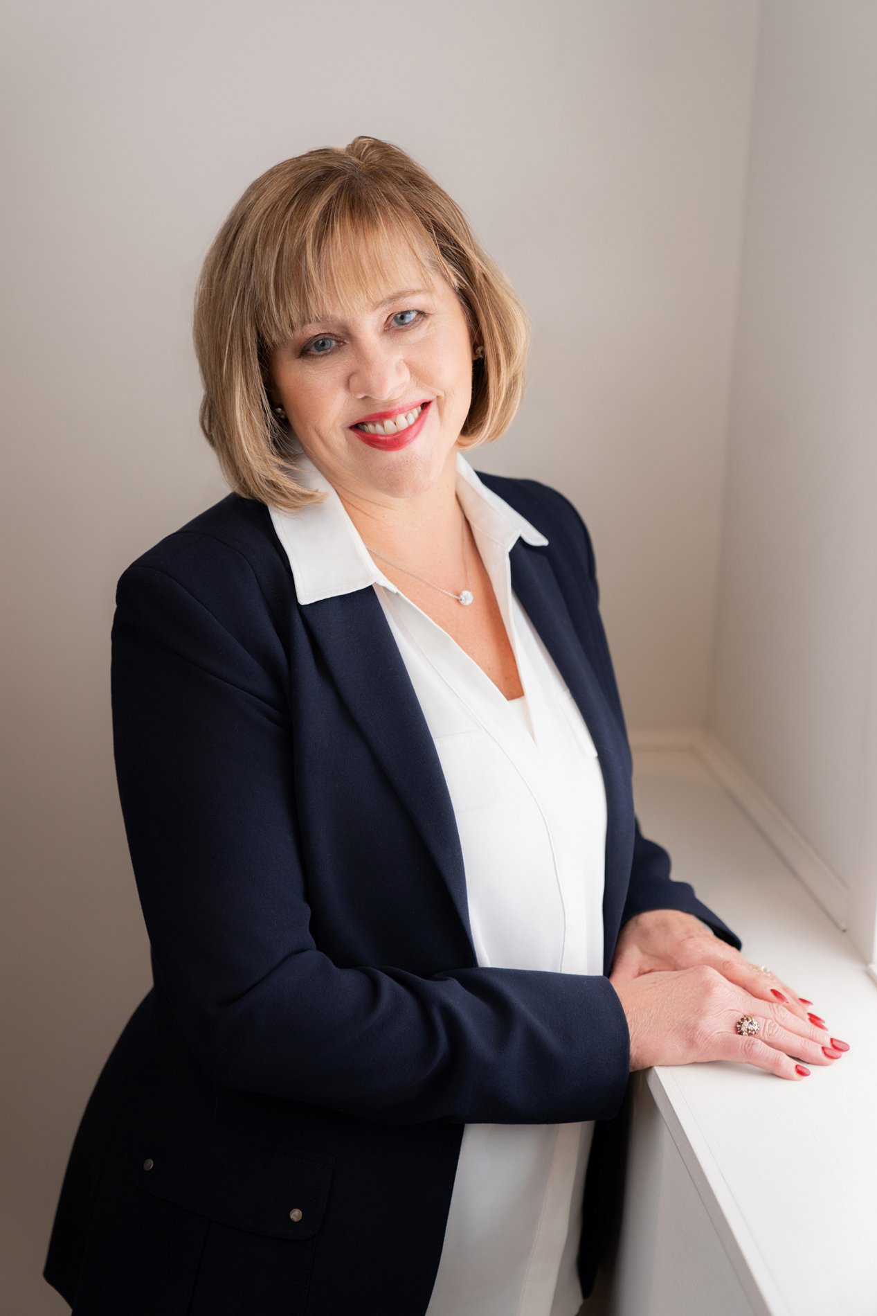 Cottage Grove Chamber of Commerce President smiling during a portrait session.