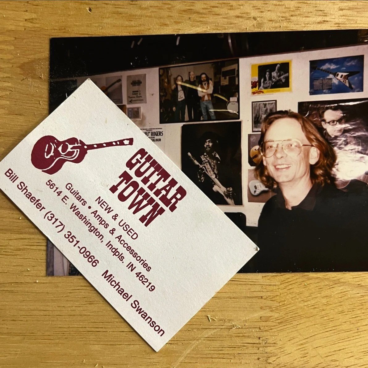 Snapshot of Bill Shaefer in his shop, Guitartown, in Irvington, Indiana, in the 1990s, next to a business card from the same shop with names Bill Shaefer and Michael Swanson.