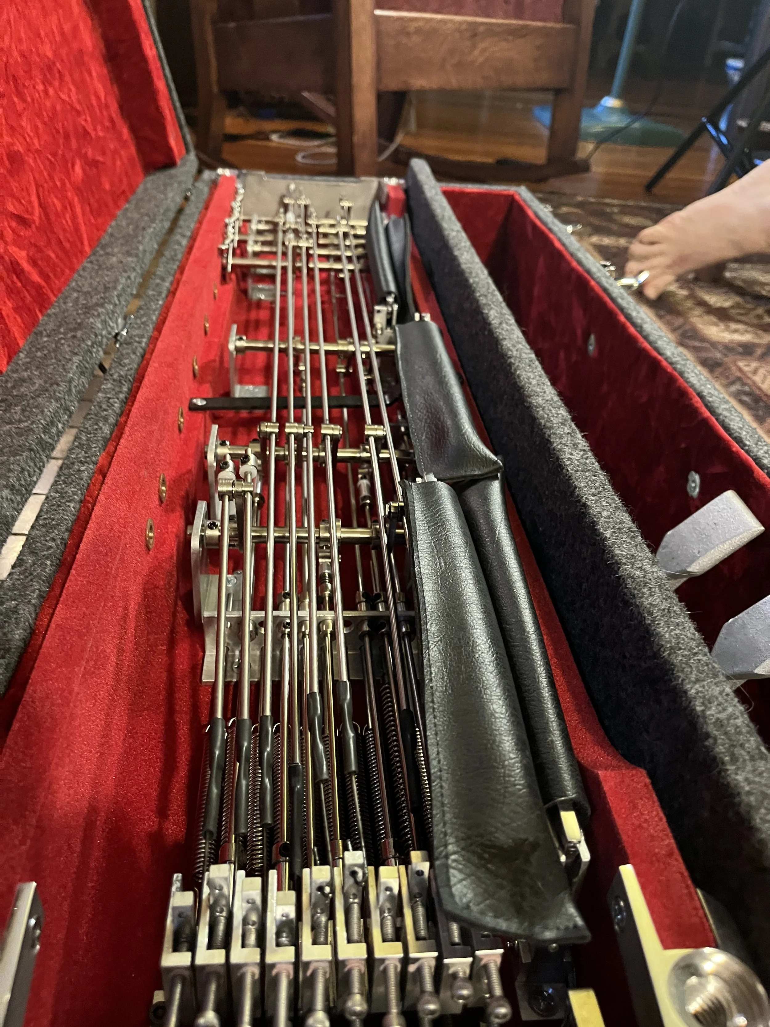 Emmons Resound'65 S10 Pedal Steel in hard shell storage case, showing the guitar's underside.