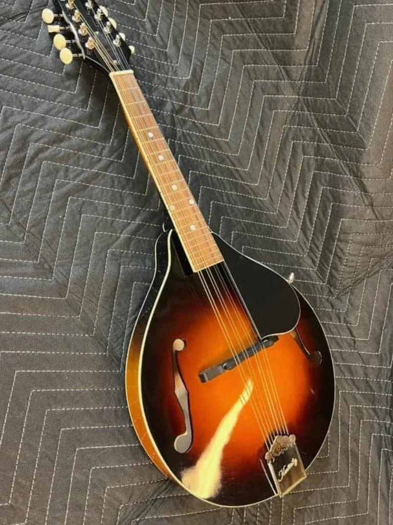 After a nice setup at our lutherie, this Kentucky mandolin sold on Two Moons' Reverb shop.