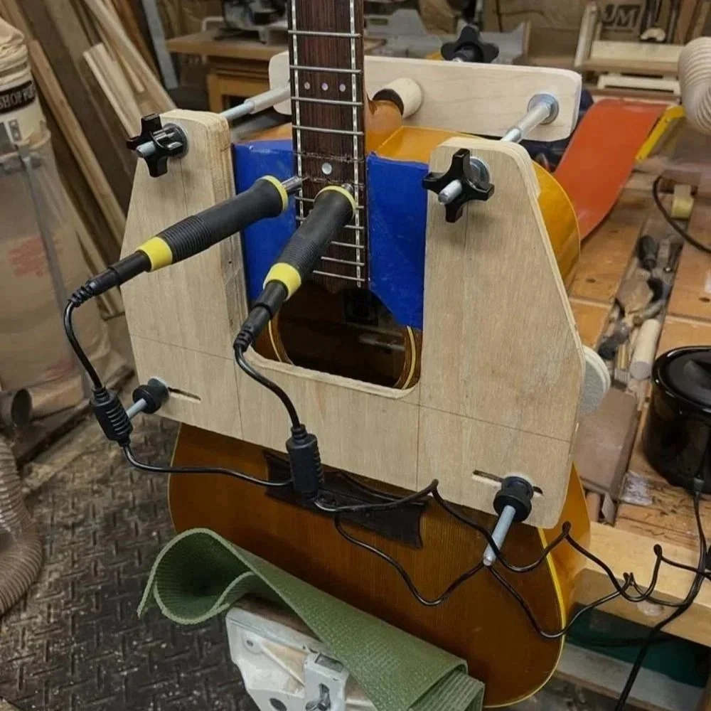 1973 Martin D-28 during neck removal as part of a neck reset--using targeted heat.
