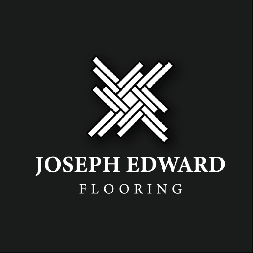 Logo for Joseph Edward Flooring featuring a stylized white woven pattern on a black background with the company name in white text.