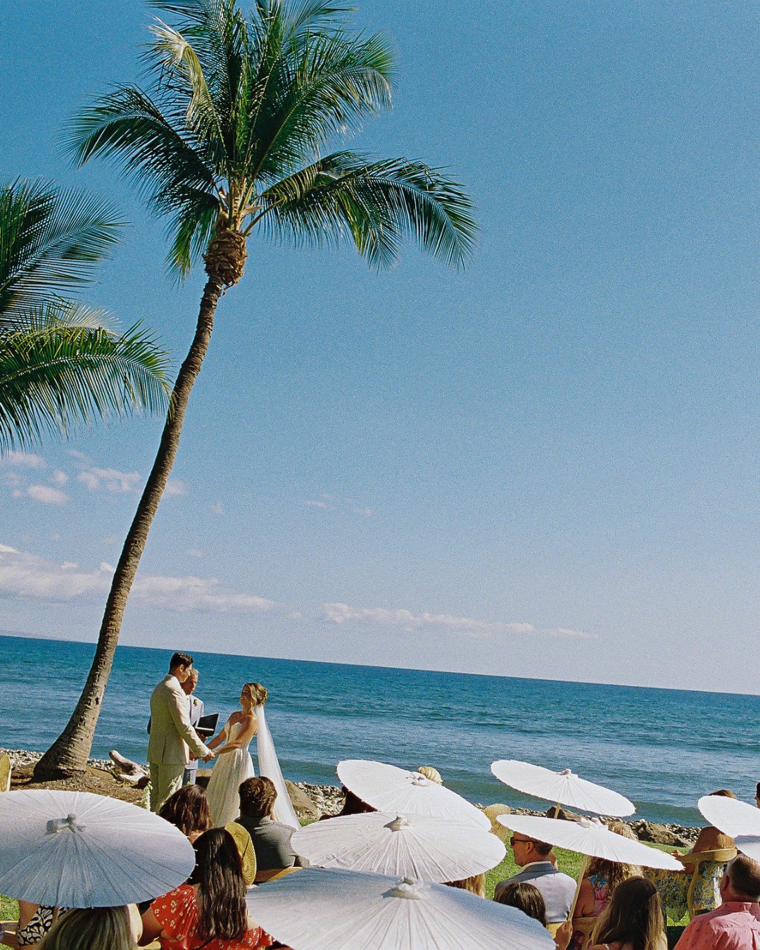 The ultimate blend of function and fashion for your tropical celebration 💛⁠
These parasols are the perfect accessory for an island wedding. ⁠
⁠
Planning: @opihilove⁠
Photography: @dmitriandsandra⁠
Content Creator: @mauisocialmedia_bts⁠
HMU: @ameliah
