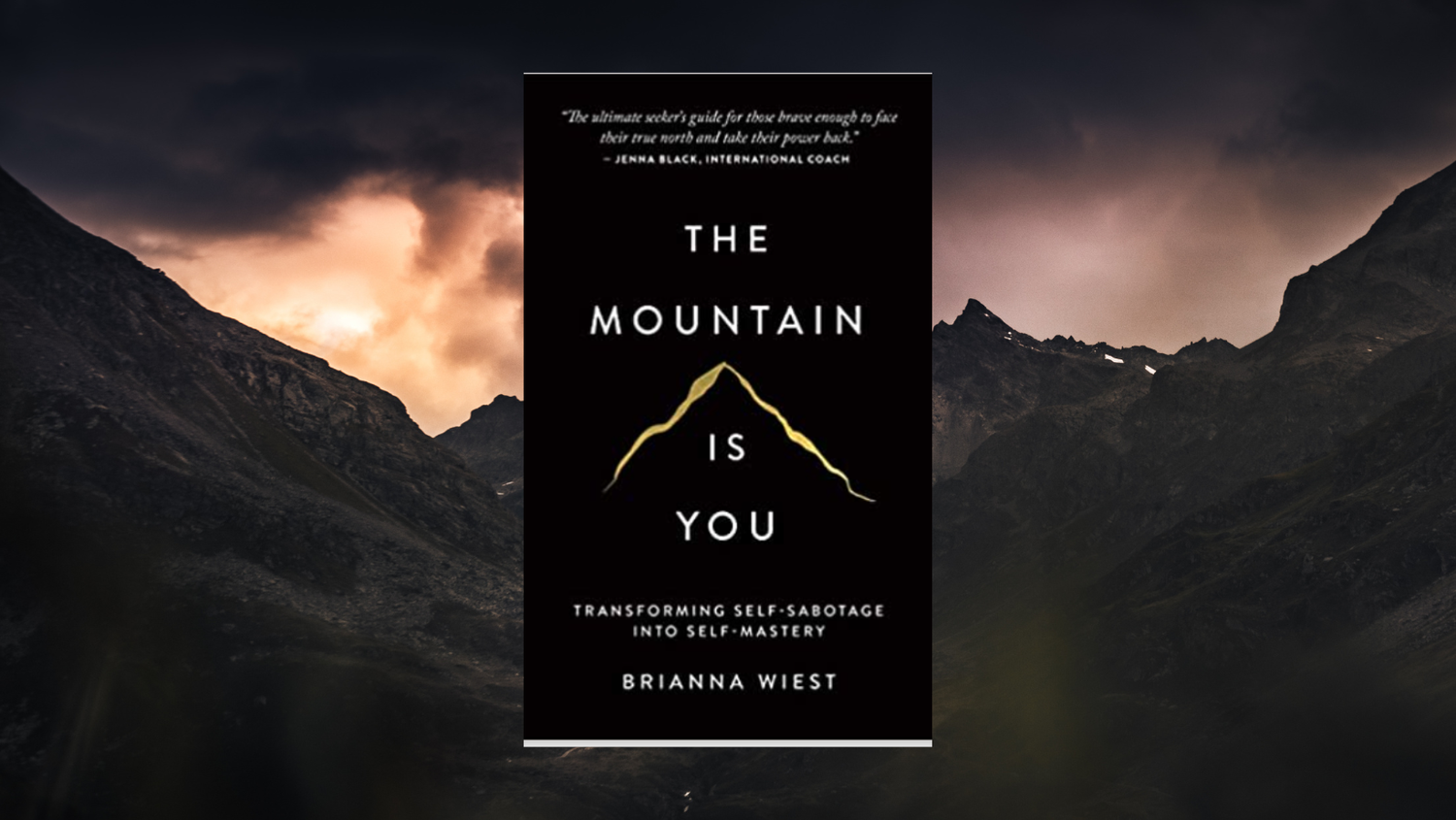 Book cover titled "The Mountain is You" by Brianna Wiest, featuring a silhouette of a mountain against a dark sky with clouds.
