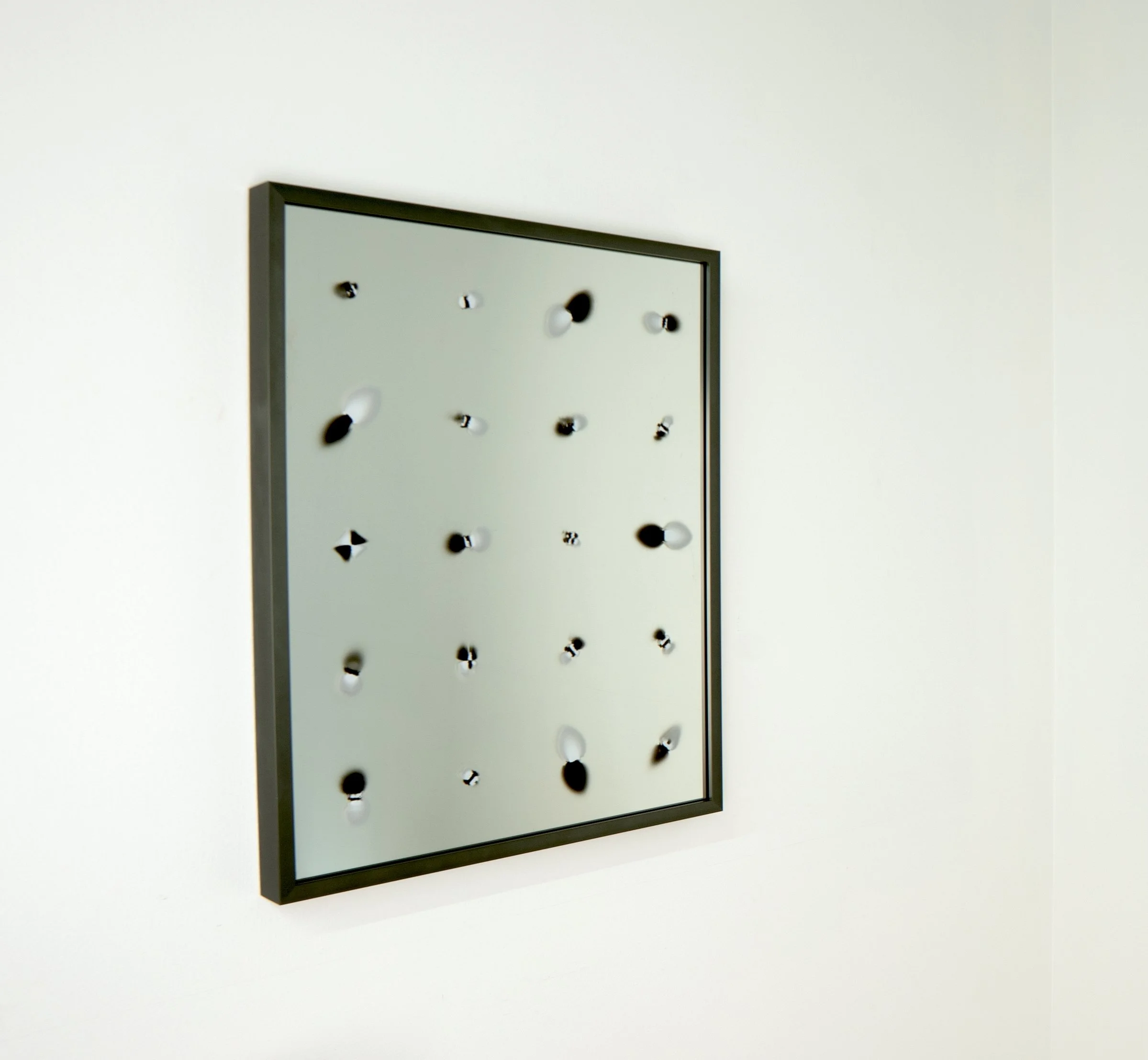   Bias Reflector, I   
UV ink on glass mirror, custom machine learning software, 18”x14”, 2025
  