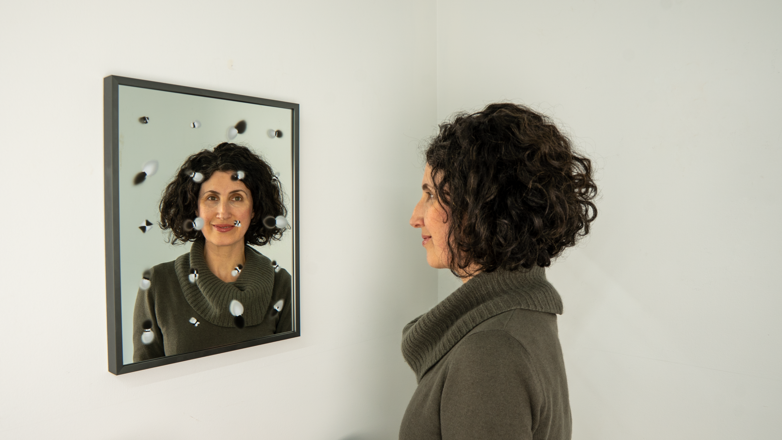   Bias Reflector, I   
UV ink on glass mirror, custom machine learning software, 18”x14”, 2025
  