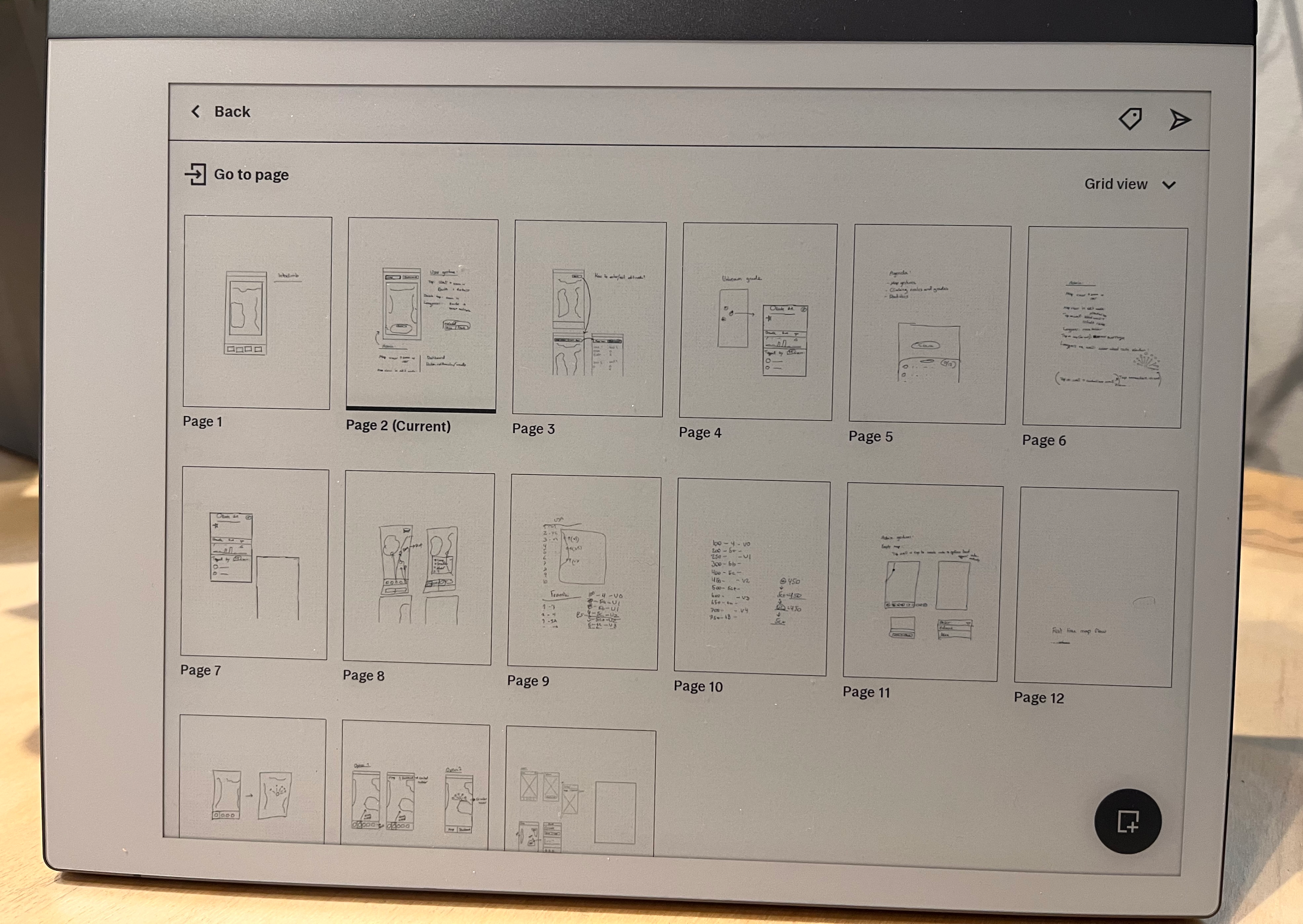 Image showing a digital tablet displaying different low fidelity sketches of intoclimb.