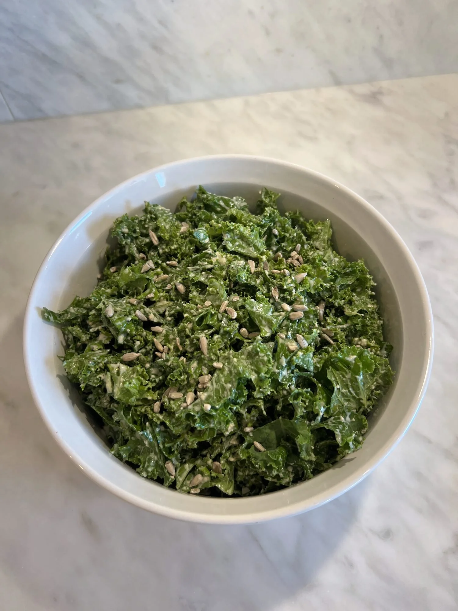 Fresh kale salad with seasonal vegetables