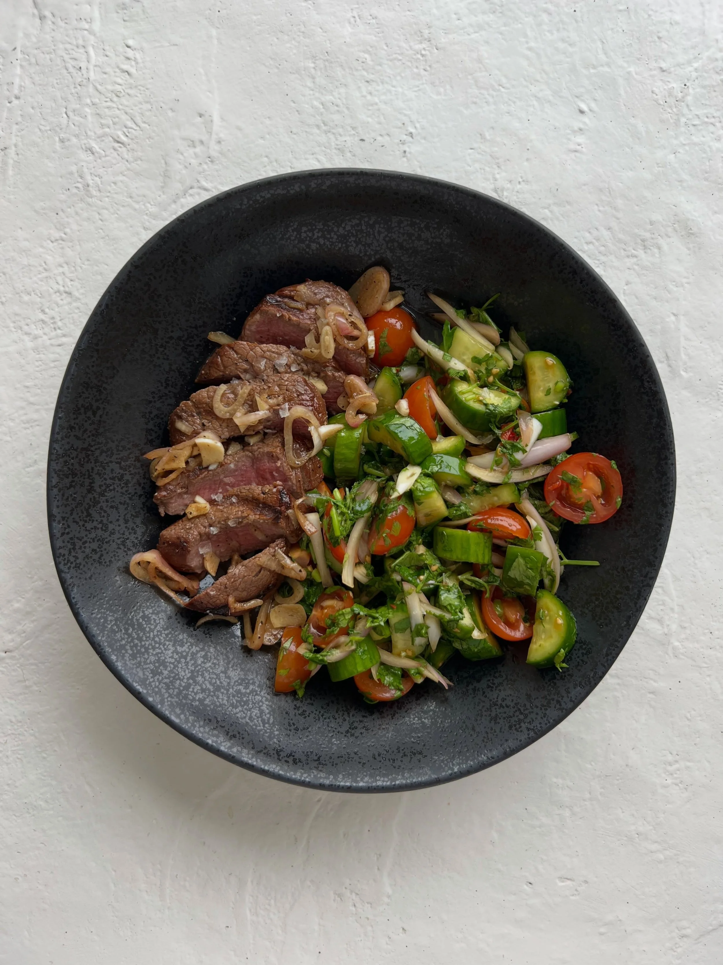 grass-fed filet steaks + the freshest spicy thai cucumber tomato salad 🌶️

THIS is my kind of summer dinner. grass-fed &amp; finished filet steaks marinated in balsamic, garlic, fresh cilantro, coconut aminos + a few other really good things, grille