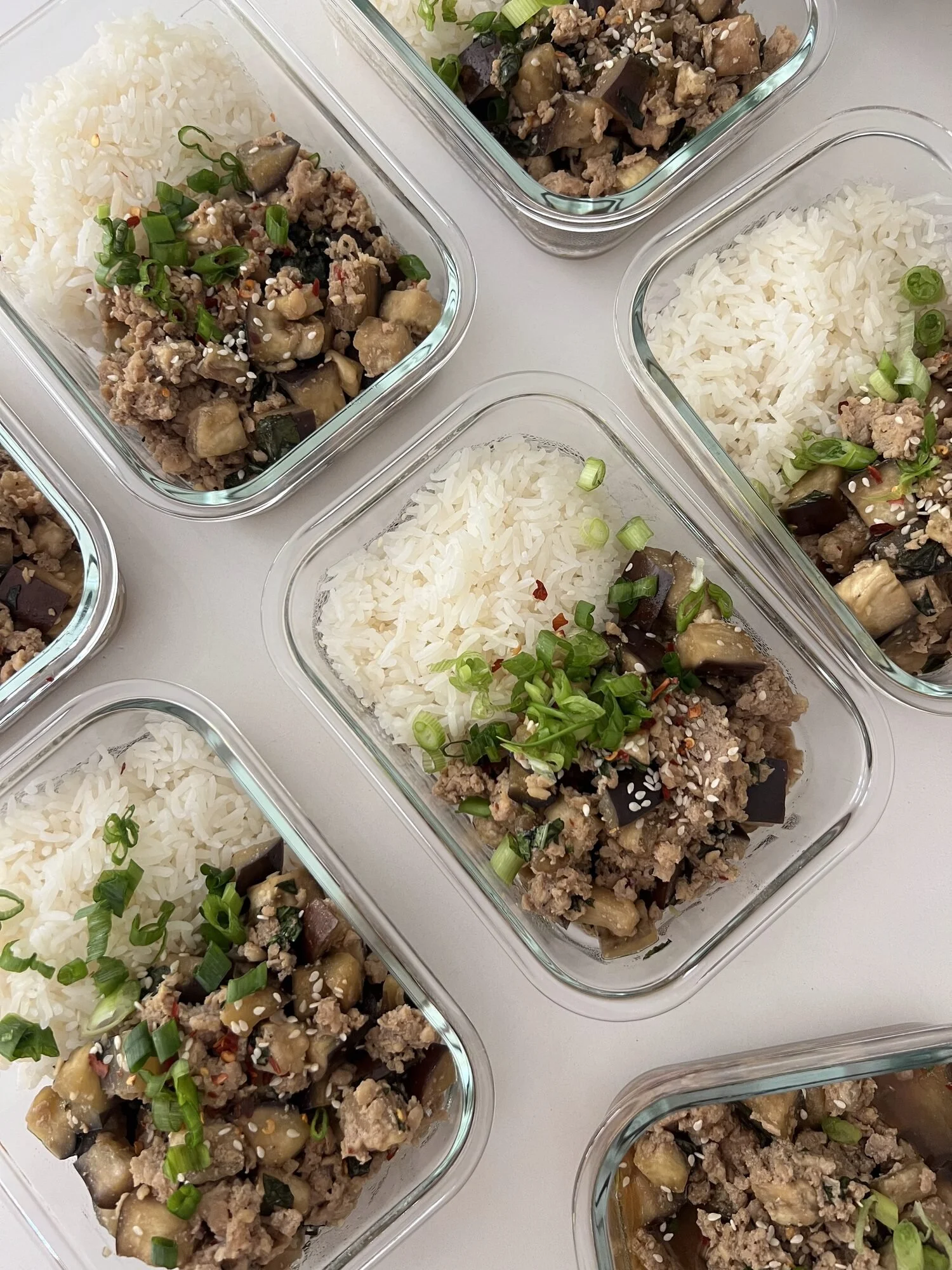 Eggplant rice bowls prepared as healthy weekly meal prep in Vancouver