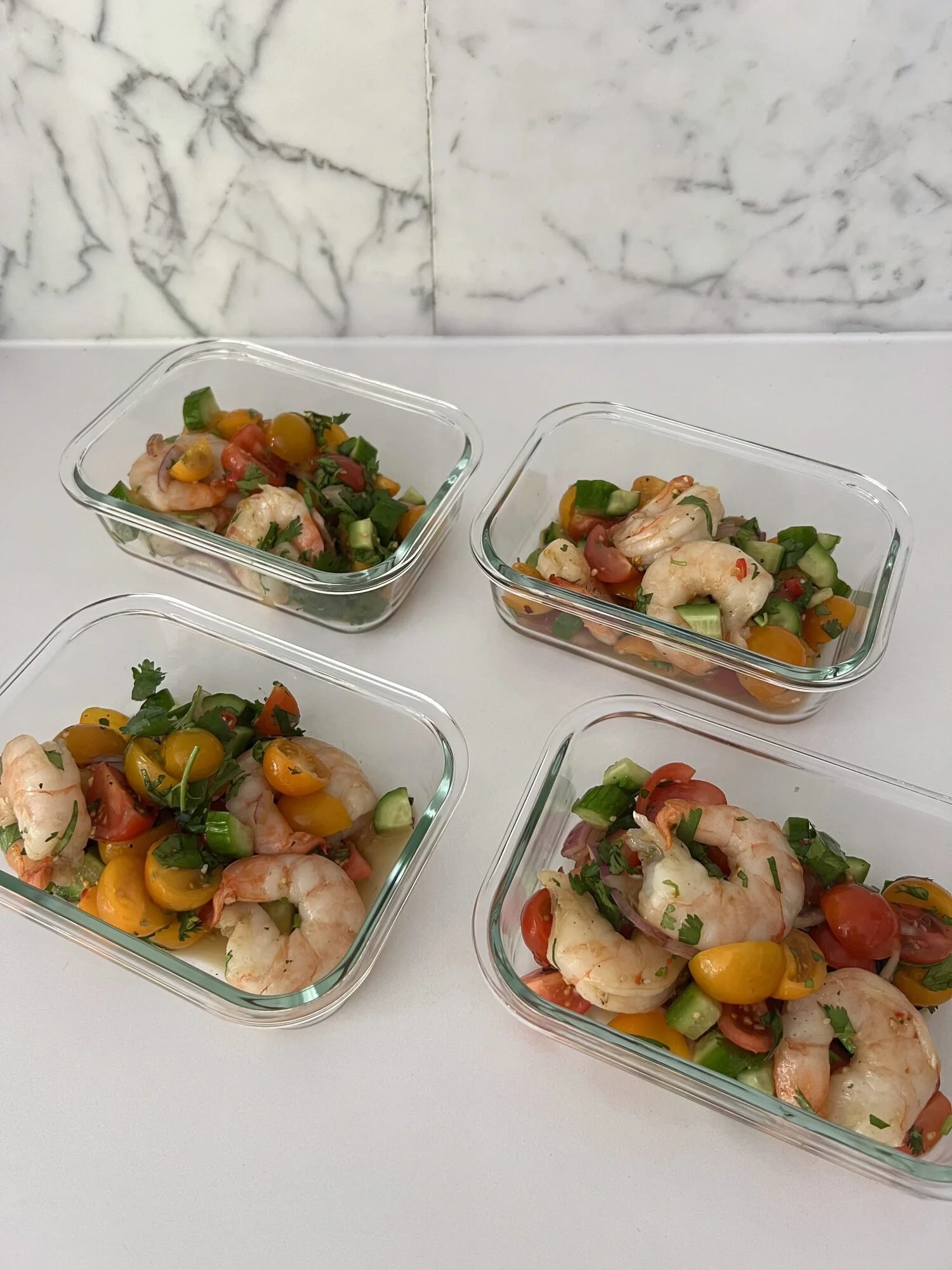 Shrimp salad in glass meal prep containers