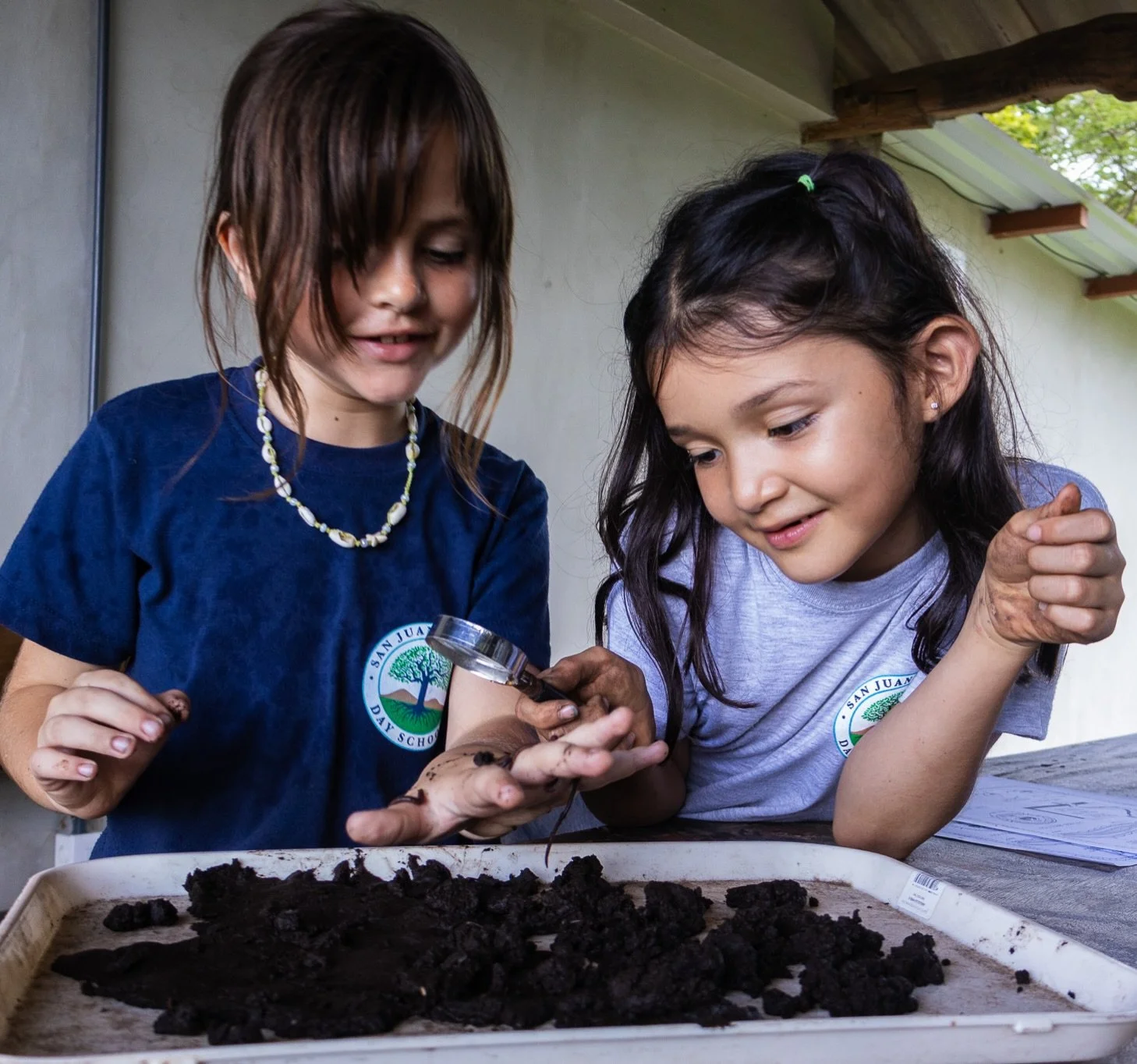 Running their hands through thick, loamy soil in a giant worm bin, 2nd graders picked out a handful of crawly creatures to examine with magnifiers.

They compared what they observed and learned about the important role worms play in healthy soil.

Wi