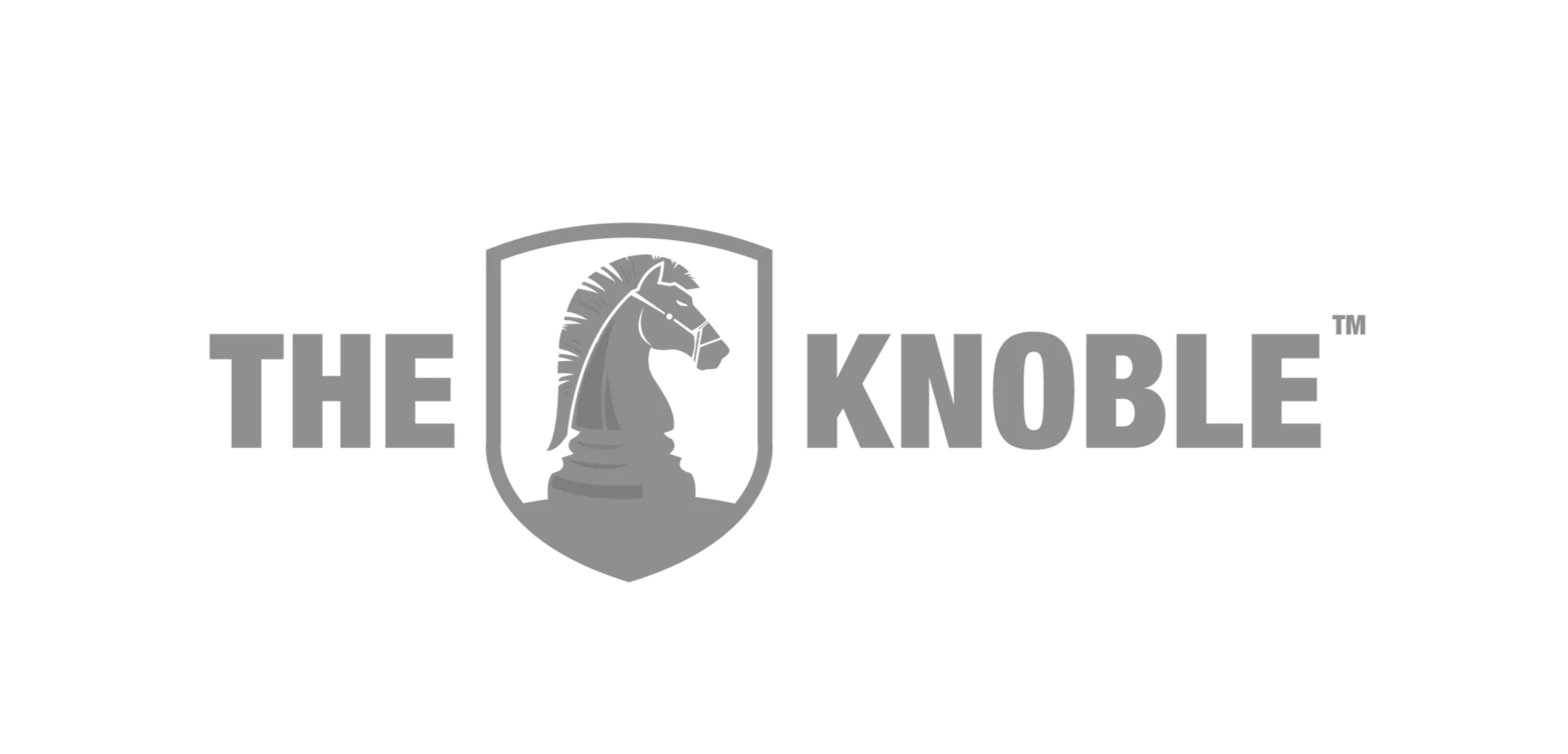 The Knoble's logo featuring a knight's helmet with a crest, positioned in the center of shield, with the words "The Knoble" on the left and right in bold, uppercase letters.