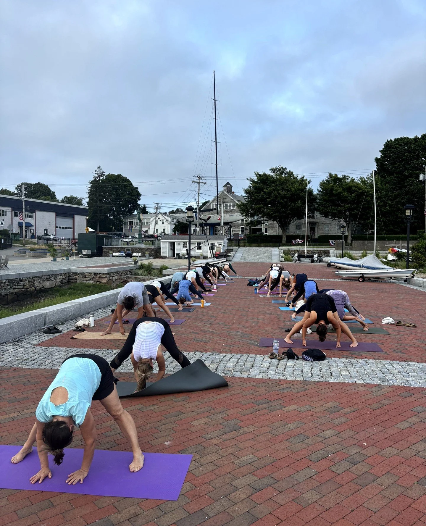 Evening yoga on the dock&mdash;where the day slows down, the water reflects the fading light, and each breath feels as expansive as the horizon. Join us tonight at 6pm on the Herreshoff Dock!