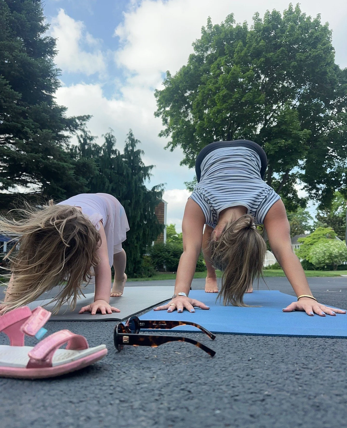 Tessa passing on the torch of yoga&mdash;one downward dog at a time 🥰