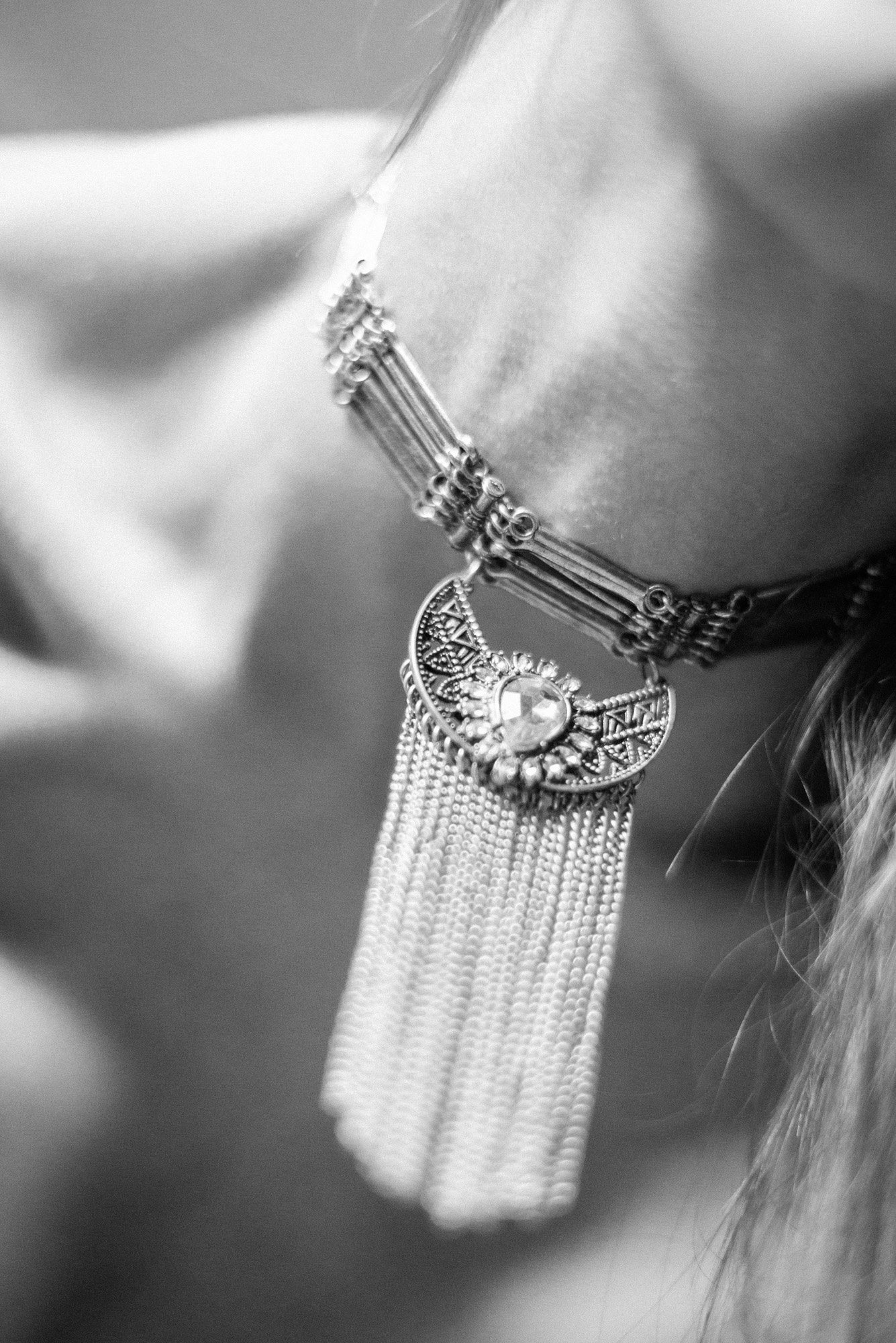 Highly abstract black-and-white portrait with blurred human form and indistinct features.