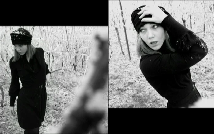 Self-portrait partially obscured, soft focus and layered depth