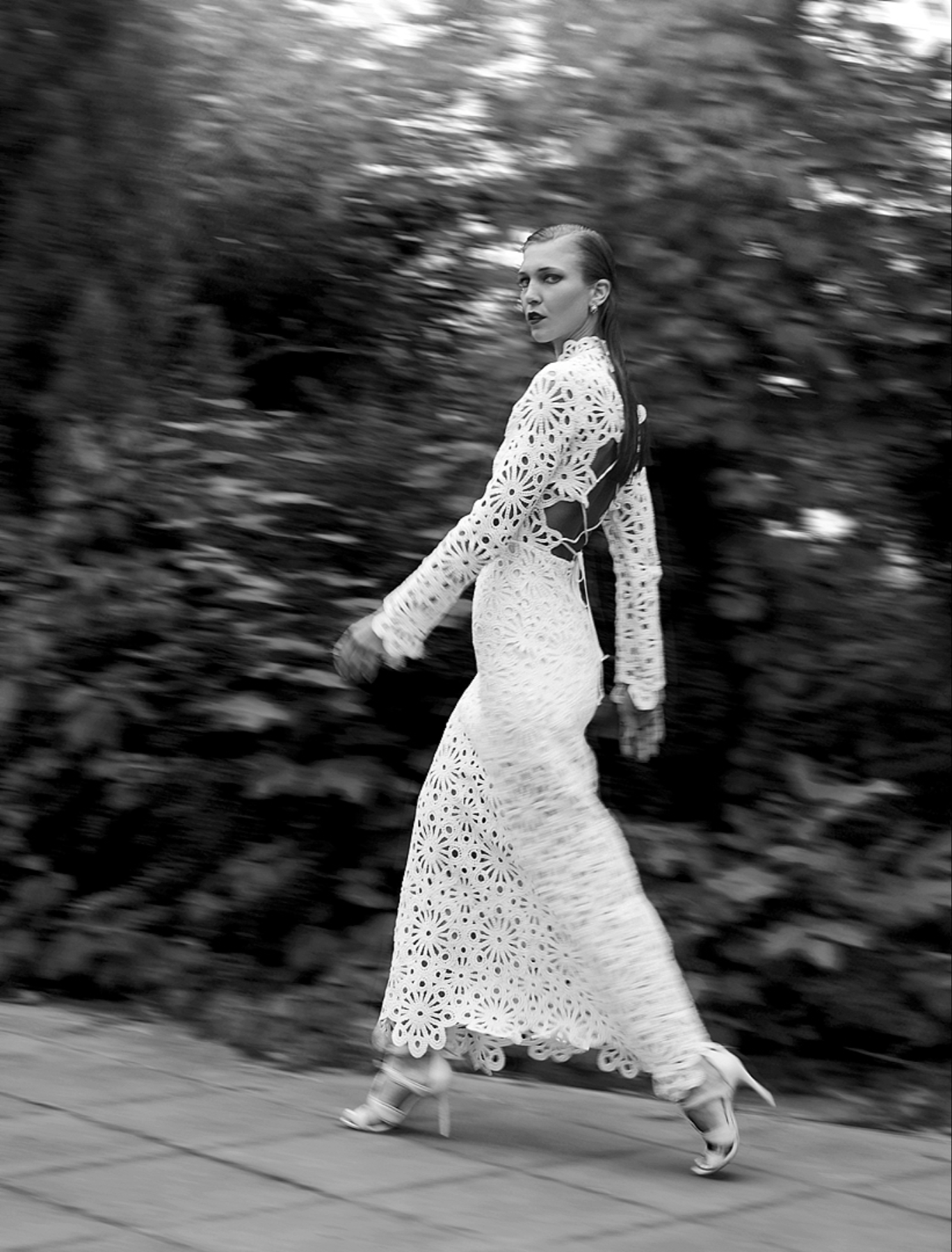 Black and white photograph of Lou Vicious in motion, captured during a collaborative outdoor photoshoot