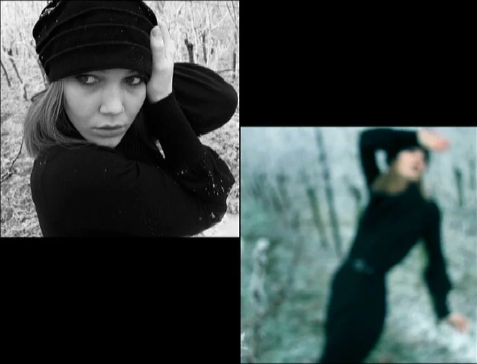 Motion-blurred self-portrait in nature, sense of movement and emotional displacement