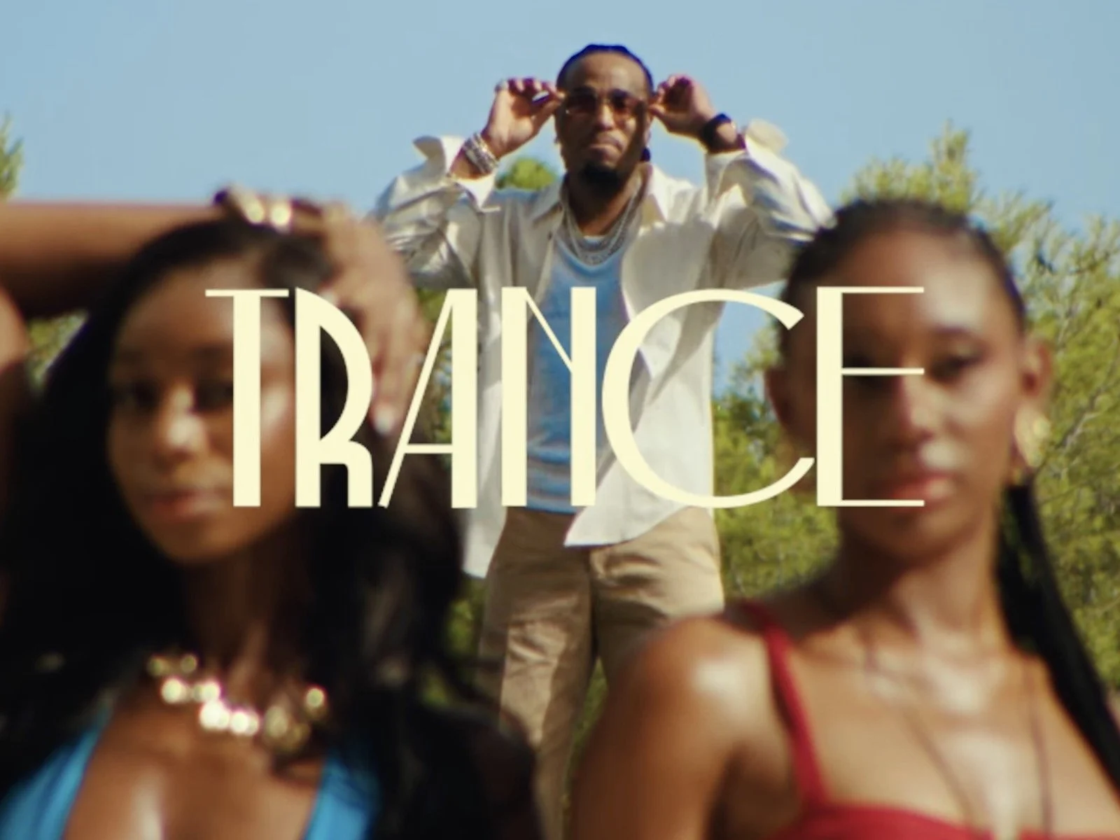 Quavo: The bikini baddies and flexing are thirst-wild in the Trance (Walk It Down) music video