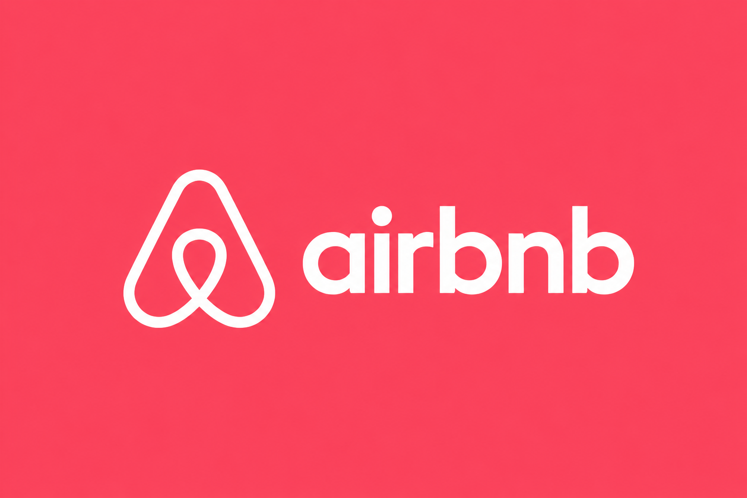 Logotipo de Airbnb con fondo rosa