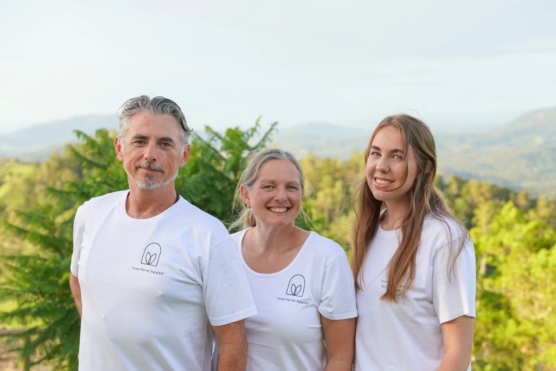 Innerform Health team of certified practitioners smiling together on the Sunshine Coast, offering integrated nutrition, nervous system, and hypnotherapy coaching online