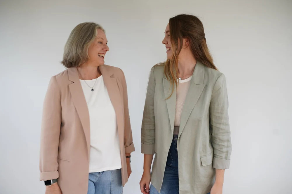 Jane and Chloe laughing together