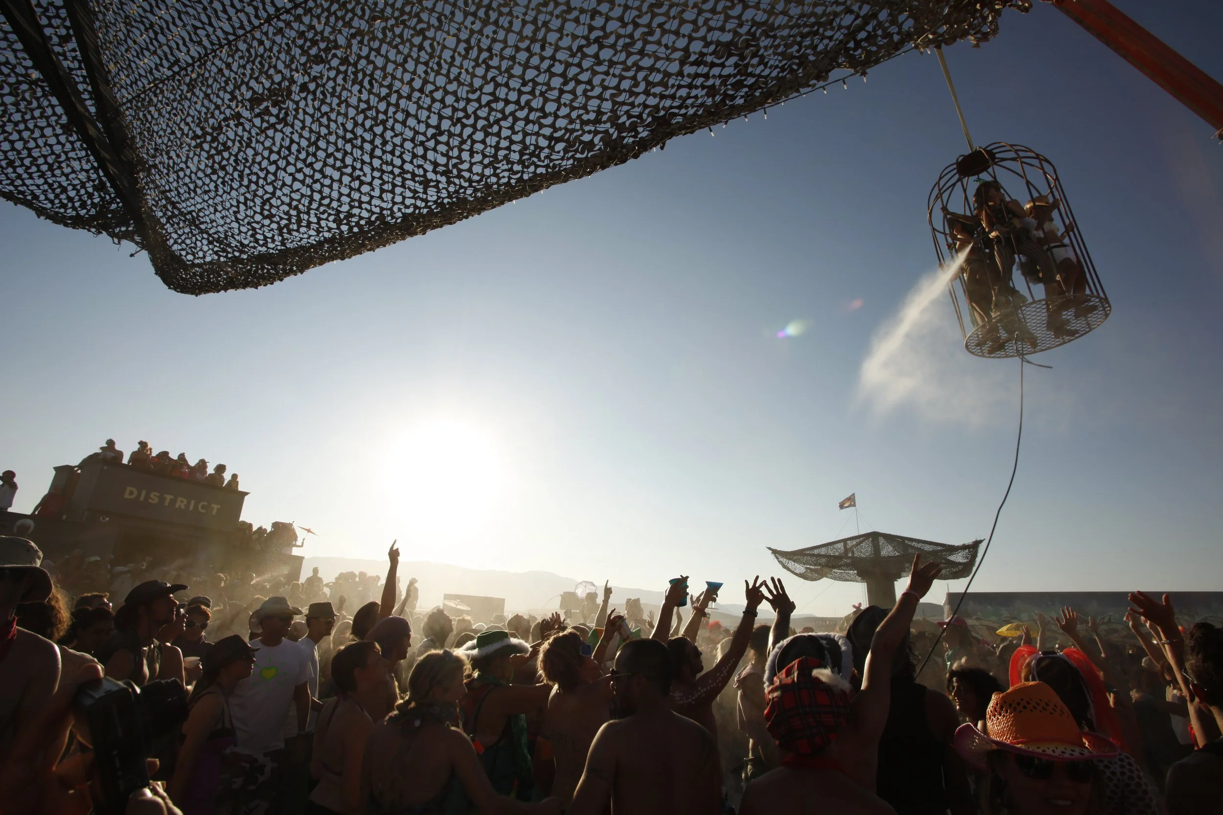 Burning Man 2011 515; Distikt Crane Cage Water Sprayer Madness.JPG