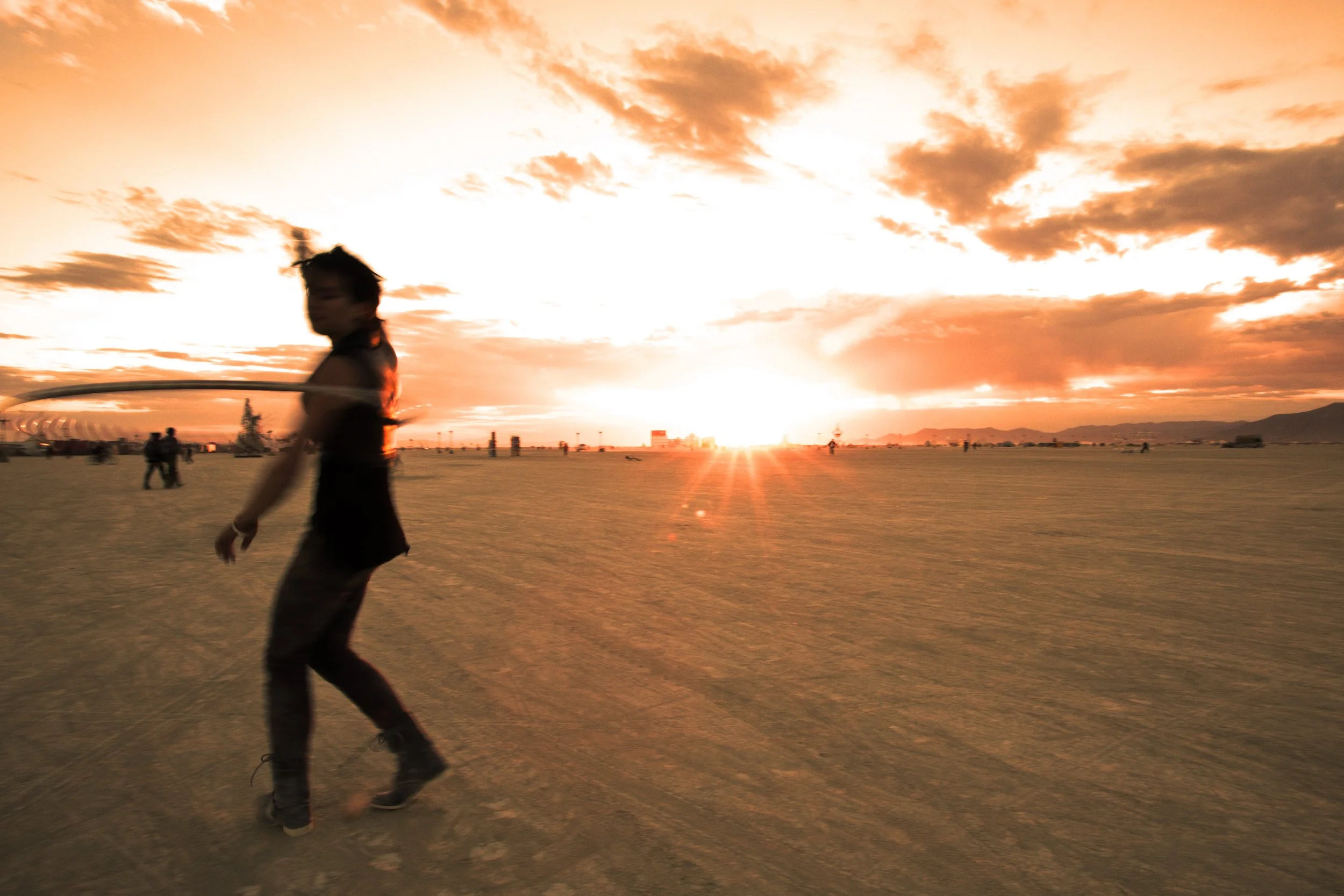 Burning Man 2012 130; Sunrise Hula Hooper.jpg