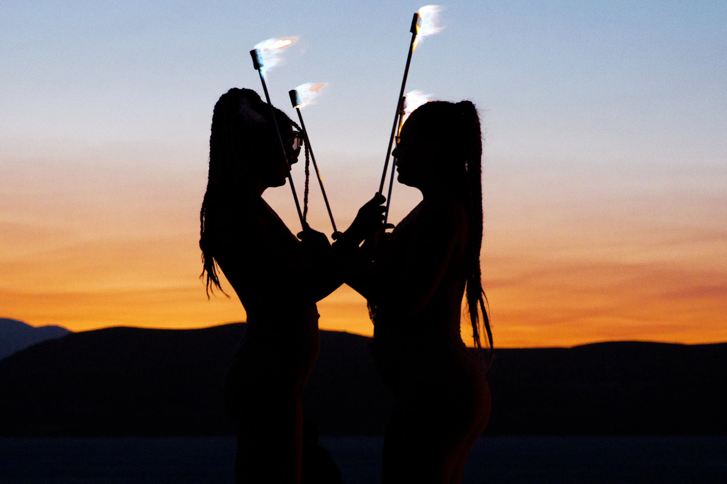 Burning Man 2018 165; WanderLOVE Circus Collective Fire Spinning Sunset Silhouette Photo by Vito Fun.jpg