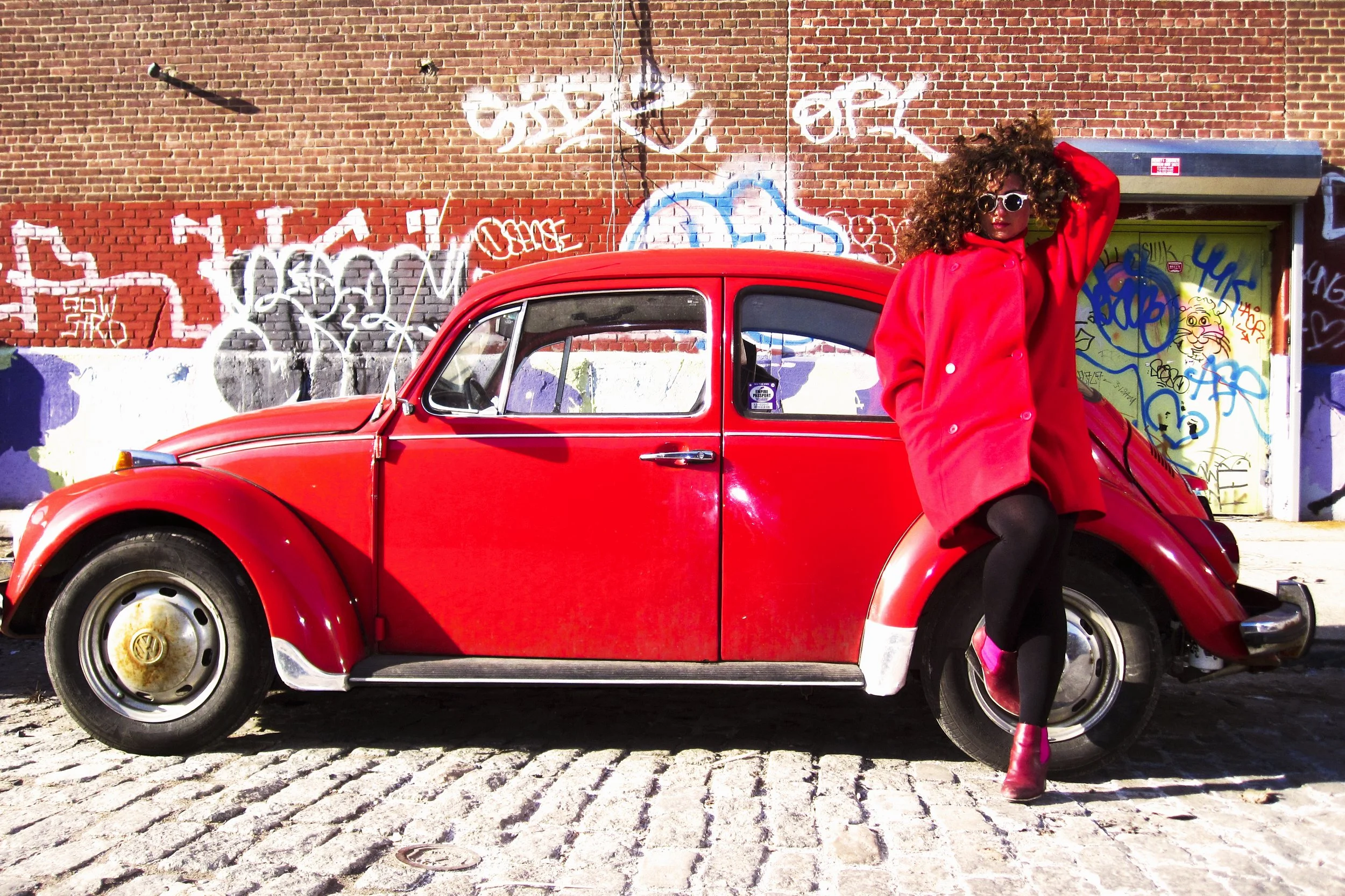 Laura Red Jacket Red Volkswagen Beetle.jpg