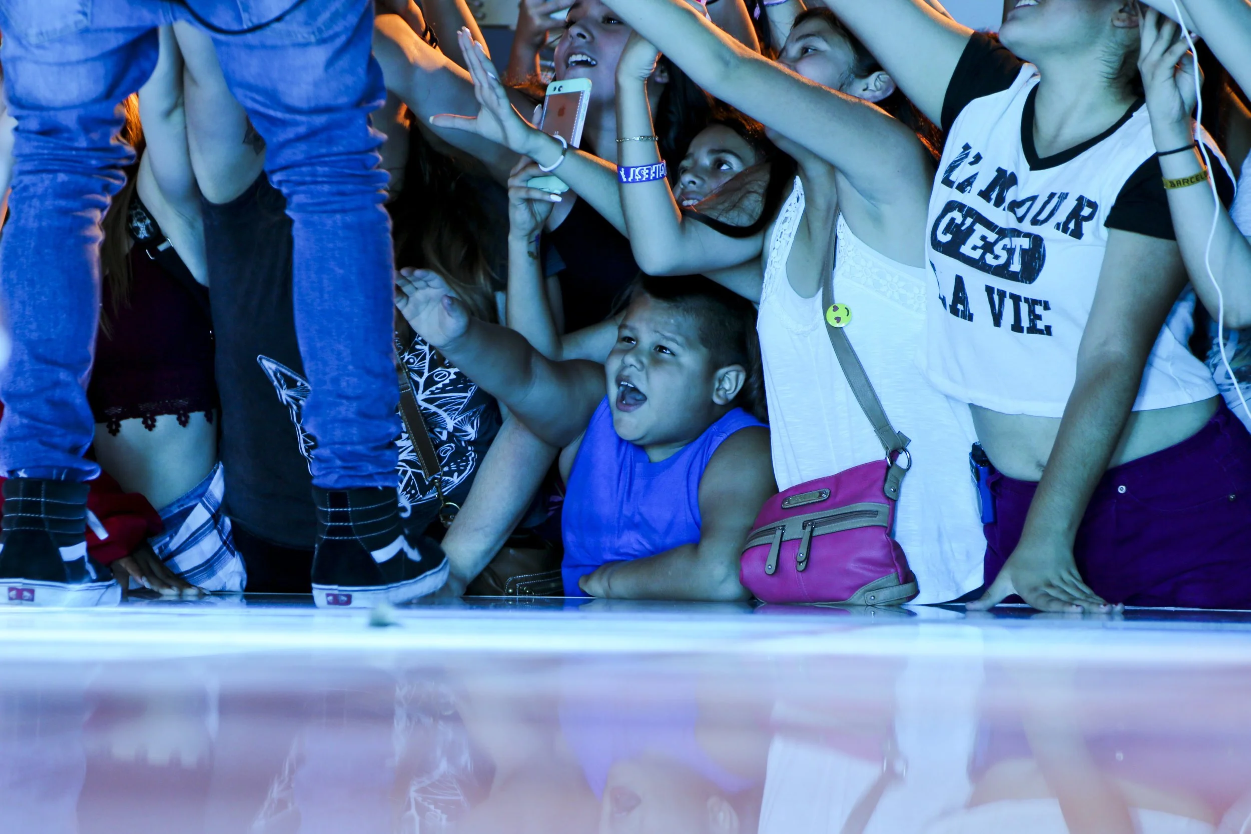 Lollapalooza 2015 22; Kid Fanning Out Superfan Photo by Vito Fun.JPG