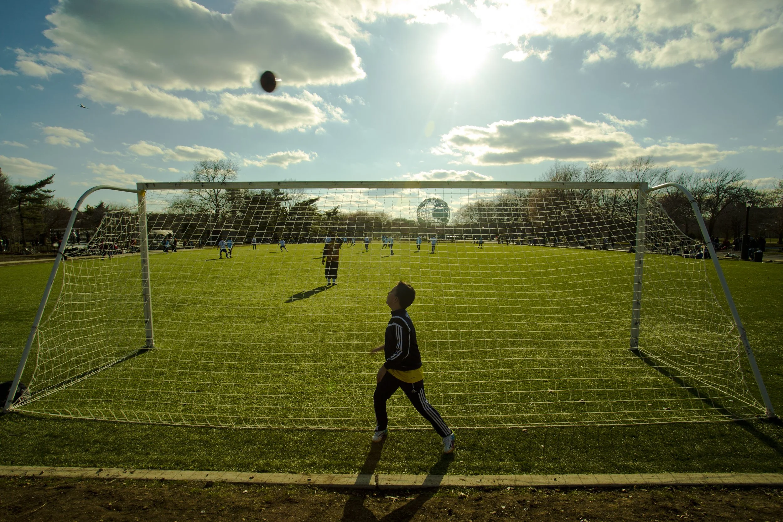 Flushing Meadows Corona Park 9; Kid Playing Behind The Soccer New Streets Photo by Vito Fun.JPG