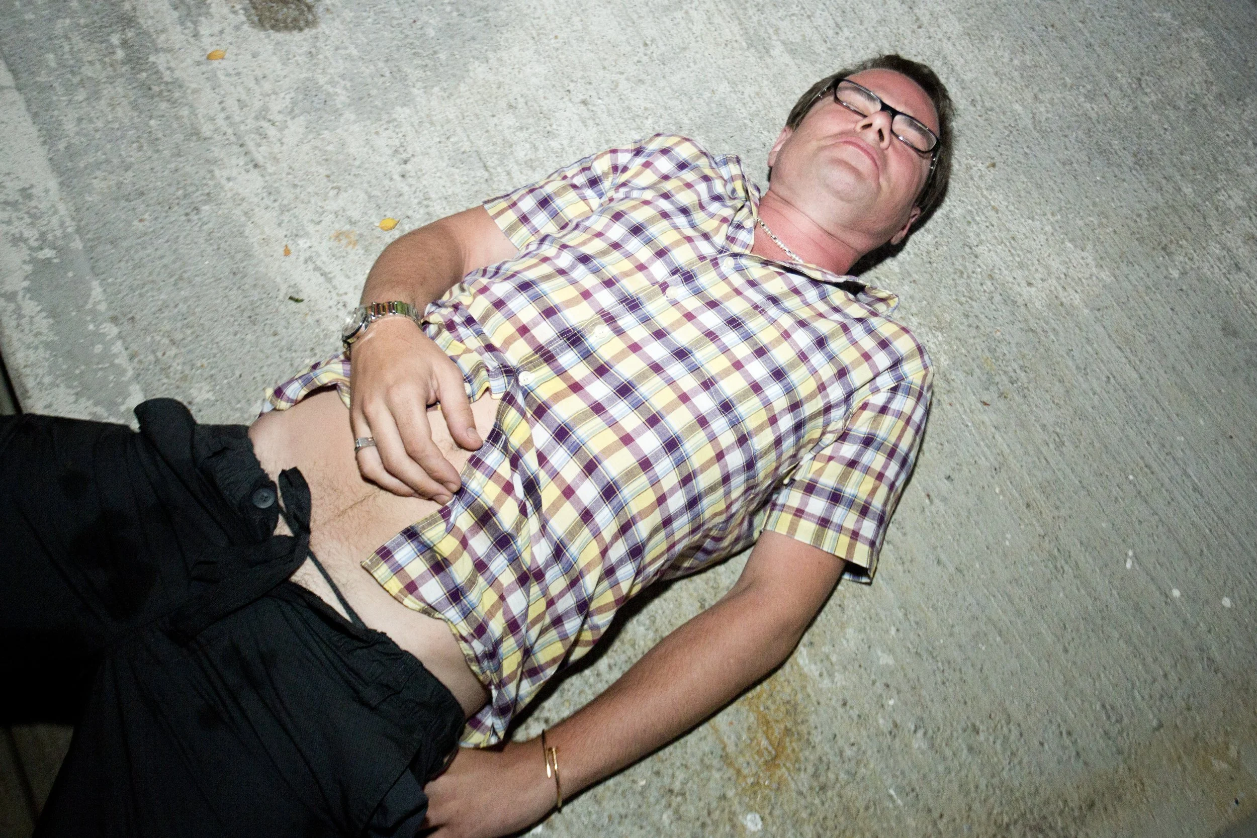 Fire Island Pines Independence Day 122; Passed Out Guy Concrete.JPG
