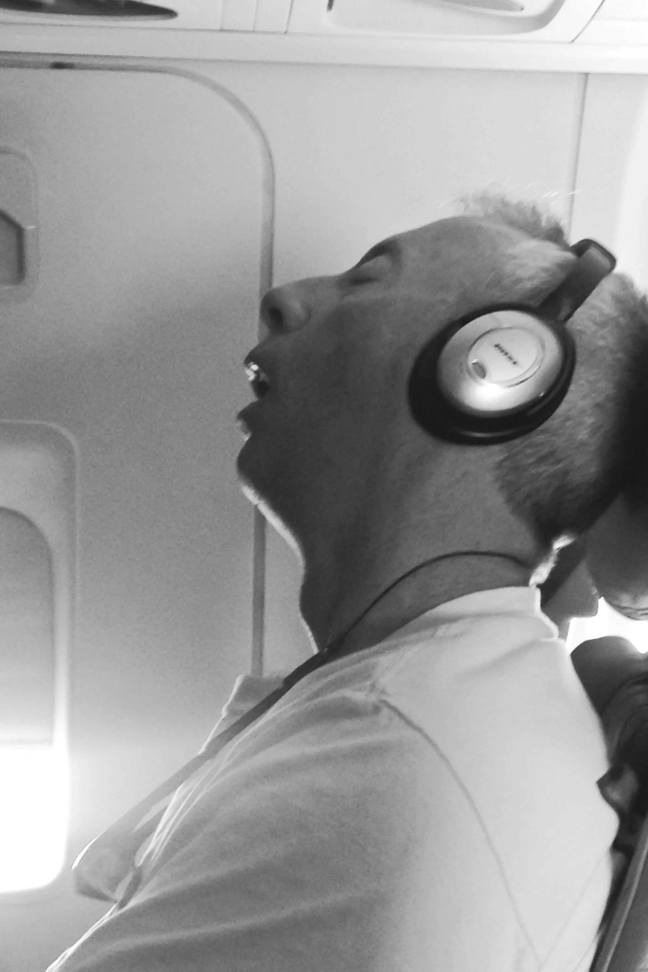 Guy Sleeping On Plane Scrill Grill.JPG