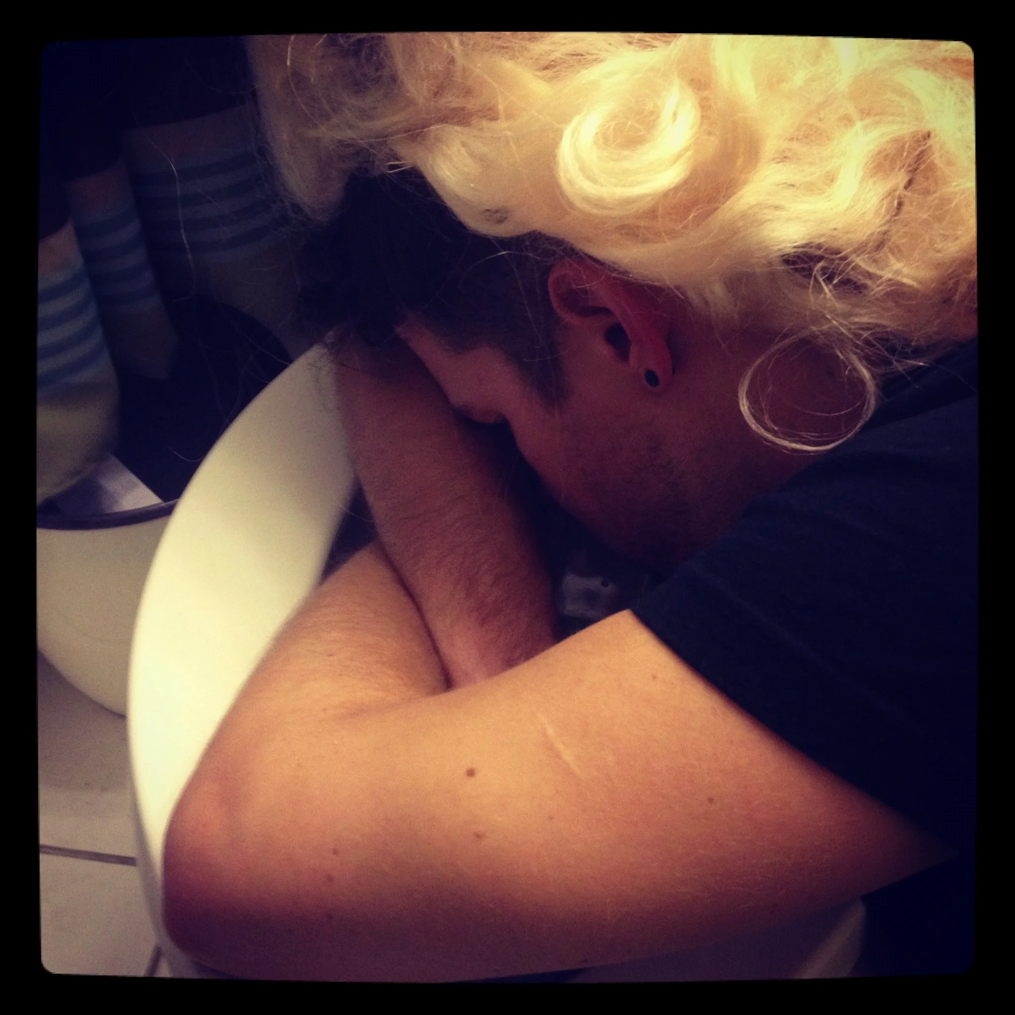 Ryan Sleeping On Toilet Wig.JPG