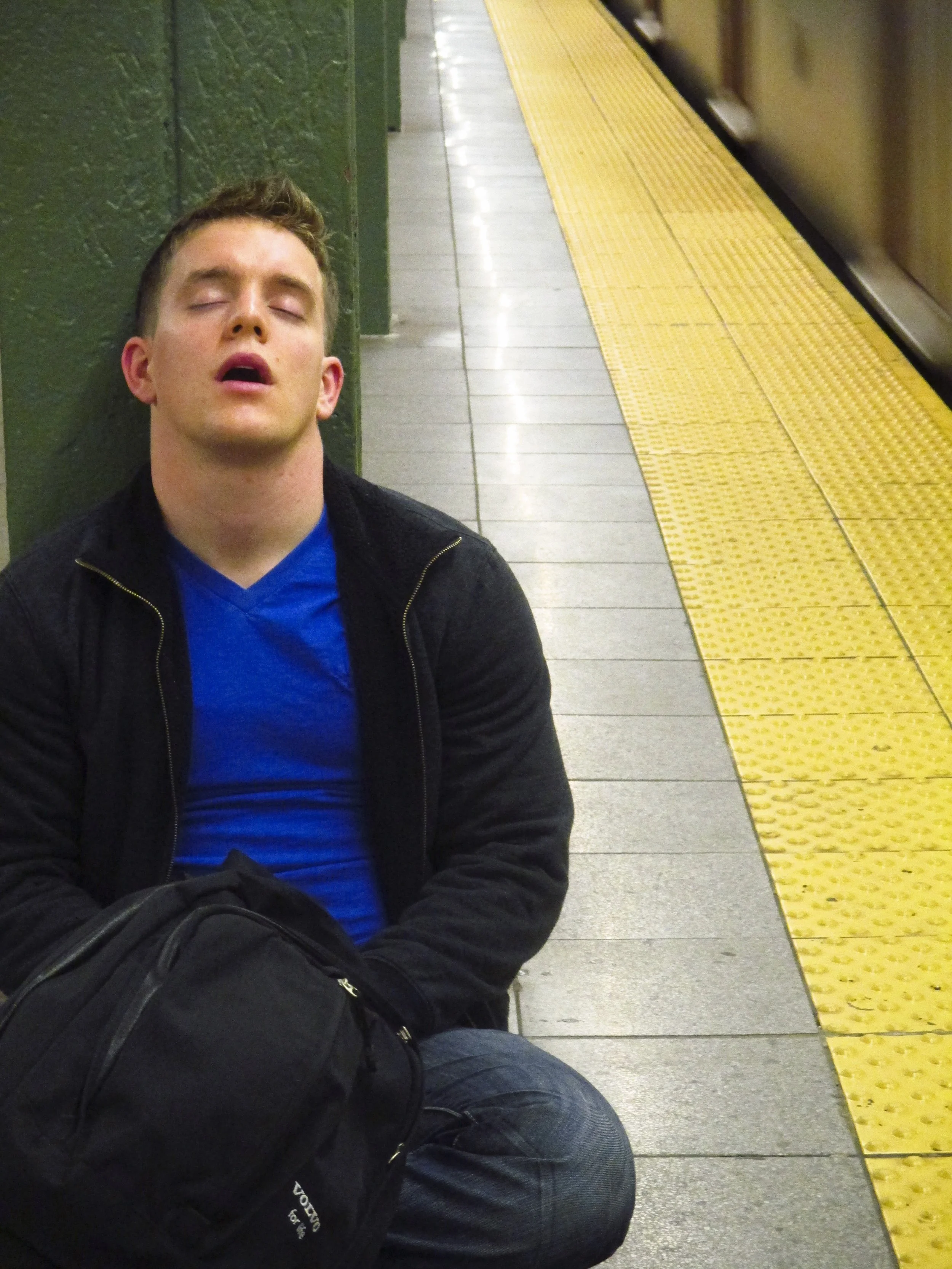 Sleeping Guy In Train Station April 2013.JPG