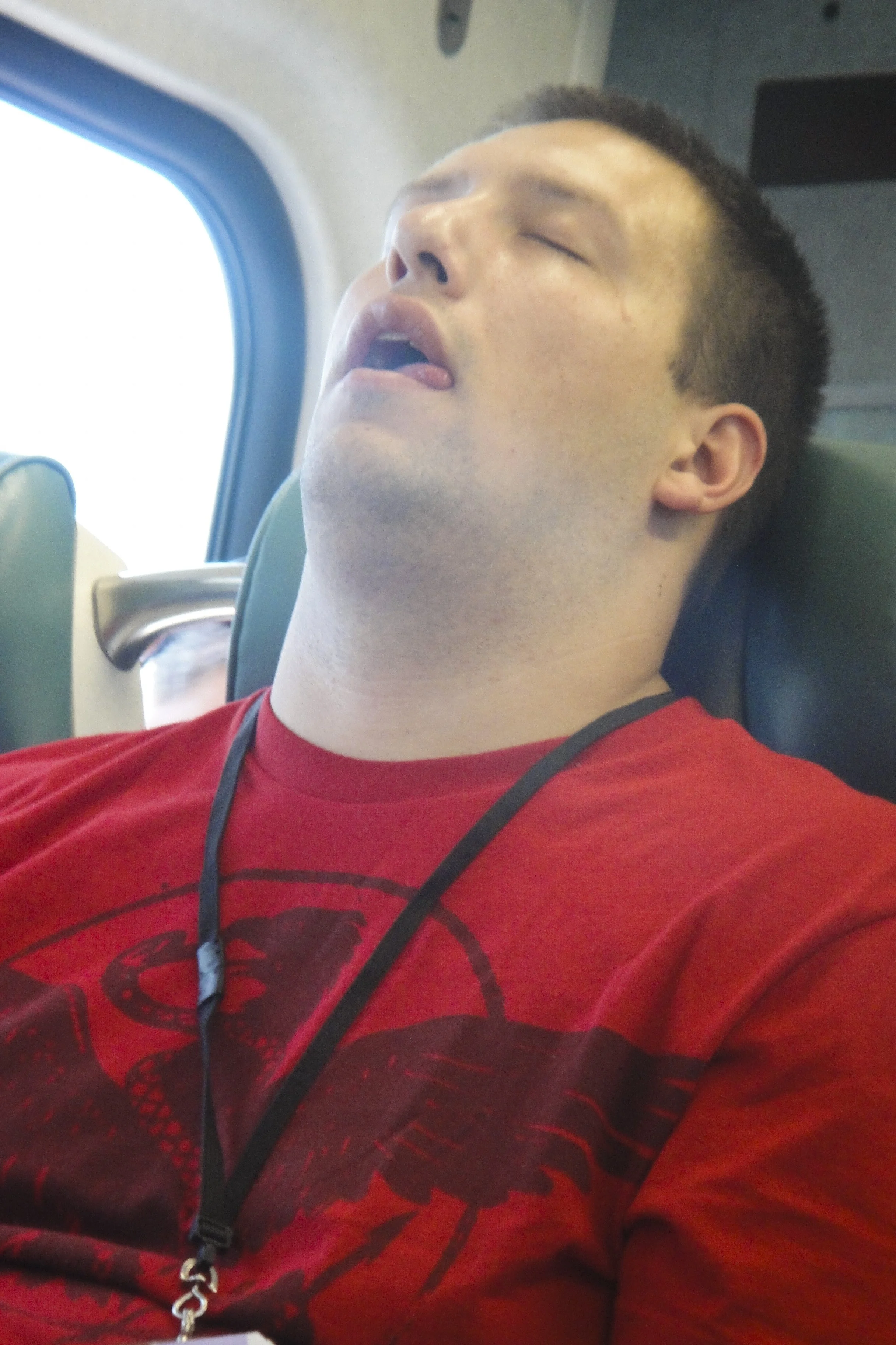 Sleeping Guy On Train July 2010 Scrill Grills.JPG