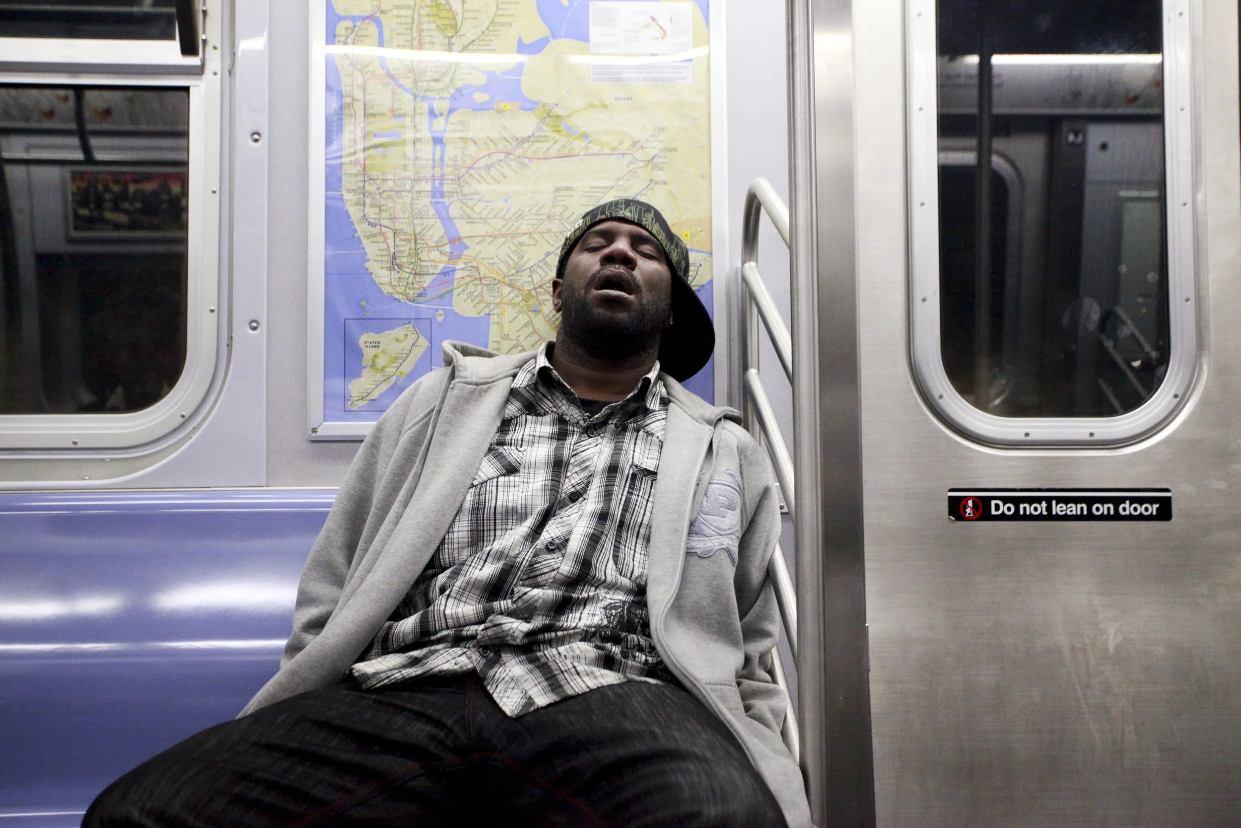 Sleeping Guy On Train Scrill Grills October 2010.JPG