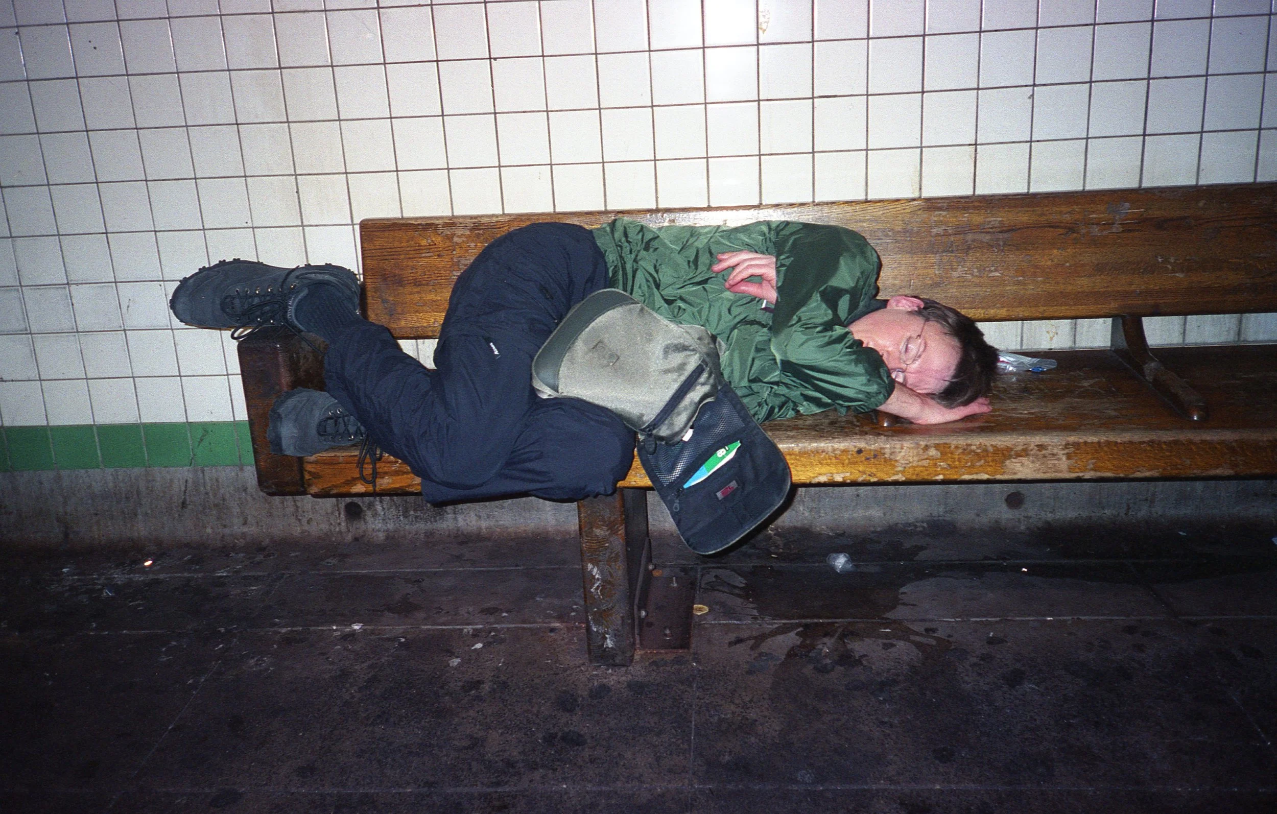 Streets; Scrill Grills Guy Sleeping 23rd Street Subway Station.jpg
