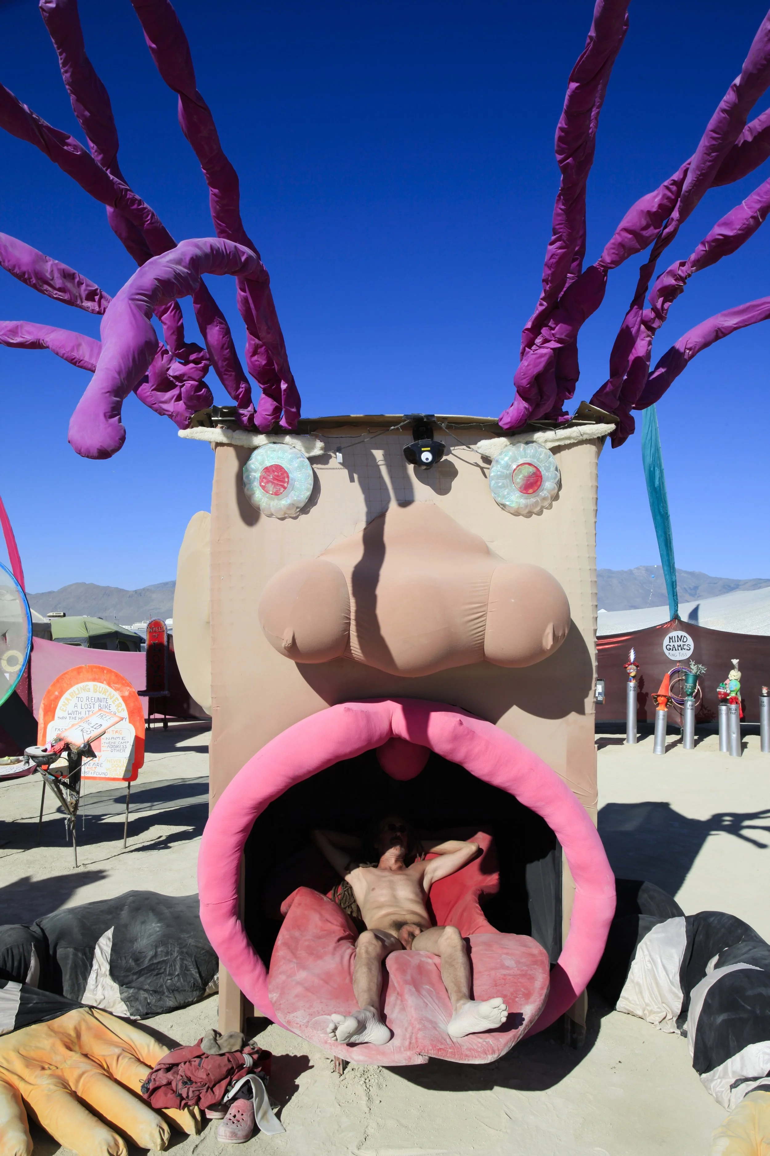 Burning Man 2010 525; Naked Guy Sleeping.JPG