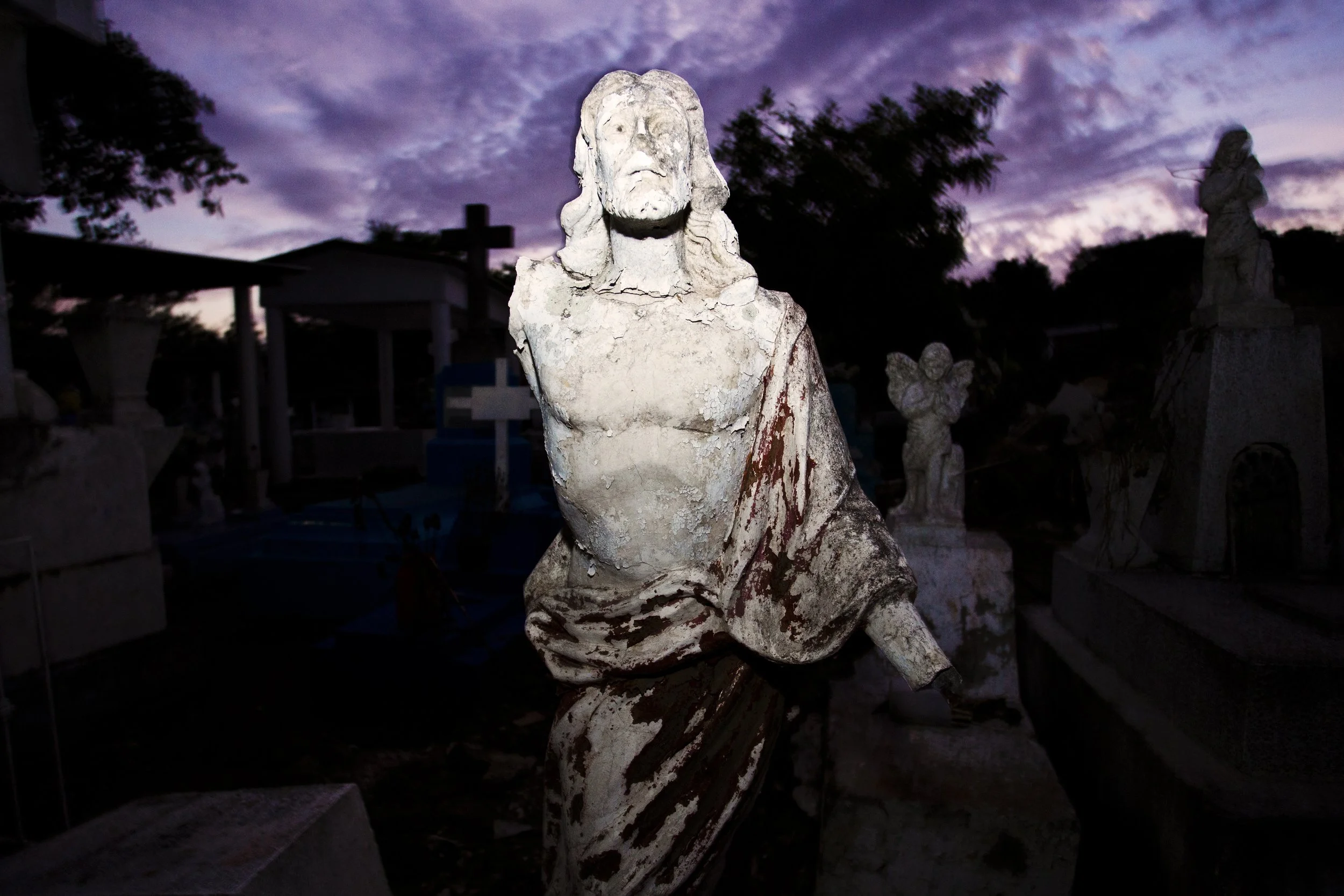 Mexico January 2013 97; Mexican Cemetary Decay Broken Jesus.jpg
