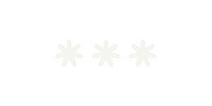 Four white asterisks on a black background
