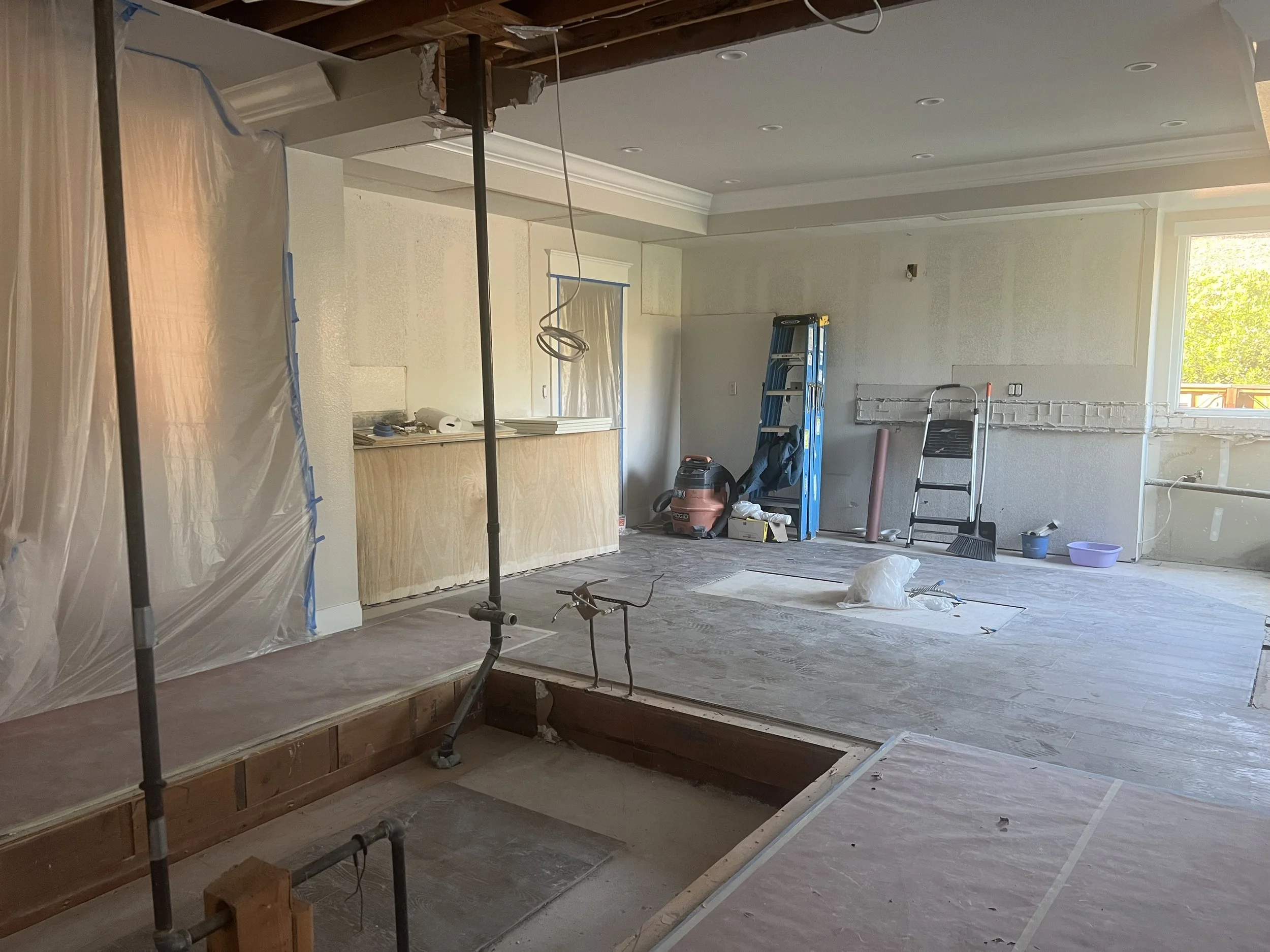 Blackhawk Kitchen Remodel - closing in door, raising floor, removing soffit