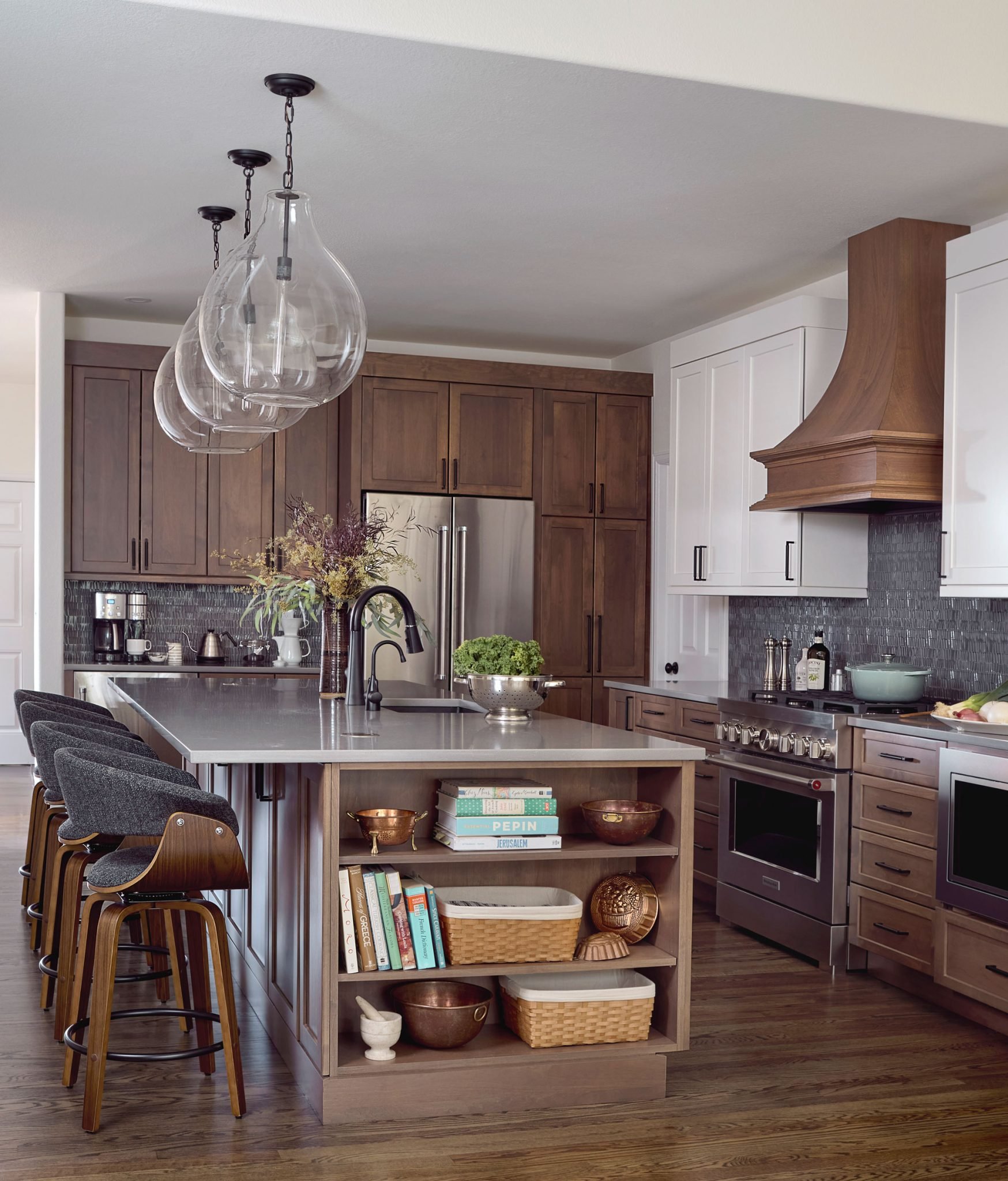 Crystal Cabinets - Small two-tone kitchen. Shaker white with wood shaker cabinets. Matching hood. Small Modern Kitchen with lots of storage.